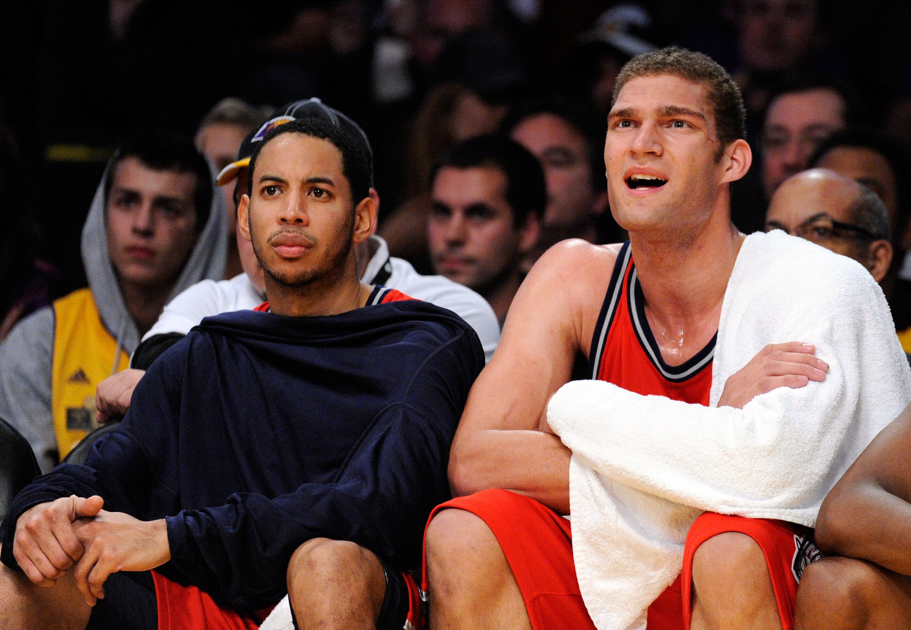 LOS ANGELES, CA - NOVEMBER 29:  Devin Harris (L) Brook Lopez (C) of the New Jersey Nets reacts after a missed shot by a teammate in the closing minutes of the basketball game against the Los Angeles Lakers at Staples Center on November 29, 2009 in Los Ang