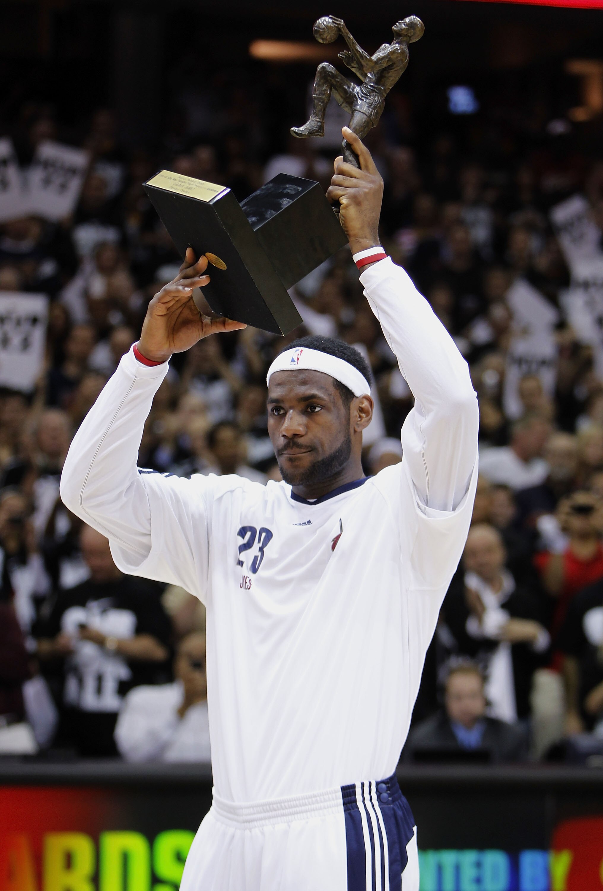CLEVELAND - MAY 03: LeBron James #23 of the Cleveland Cavaliers holds up the Maurice Podoloff Trophy after being named the 2009-2010 NBA MVP prior to playing the Boston Celtics in Game Two of the Eastern Conference Semifinals during the 2010 NBA Playoffs