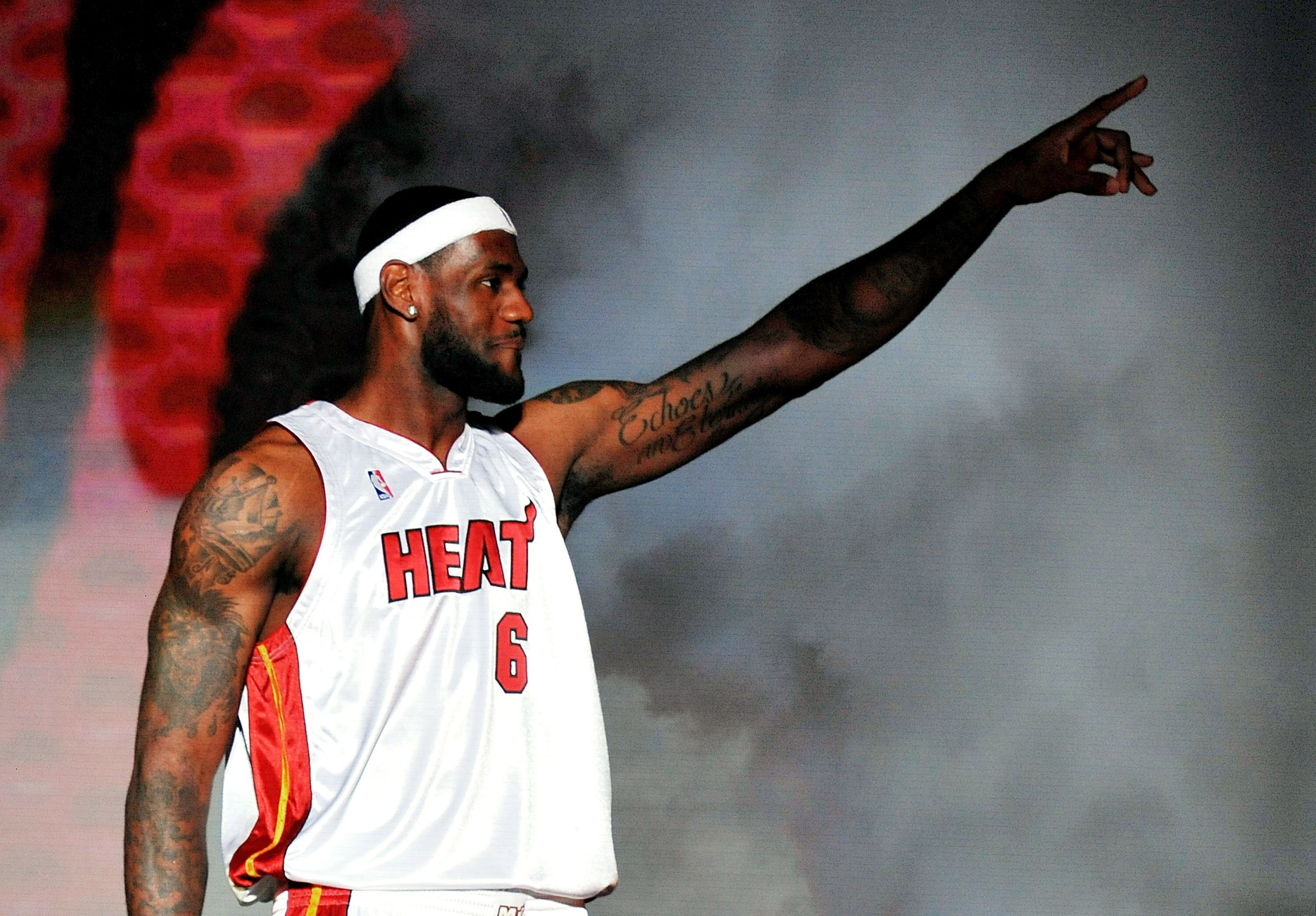 MIAMI - JULY 09:  LeBron James #6 of the Miami Heat greets fans as he is introduced during a welcome party at American Airlines Arena on July 9, 2010 in Miami, Florida.  (Photo by Doug Benc/Getty Images)