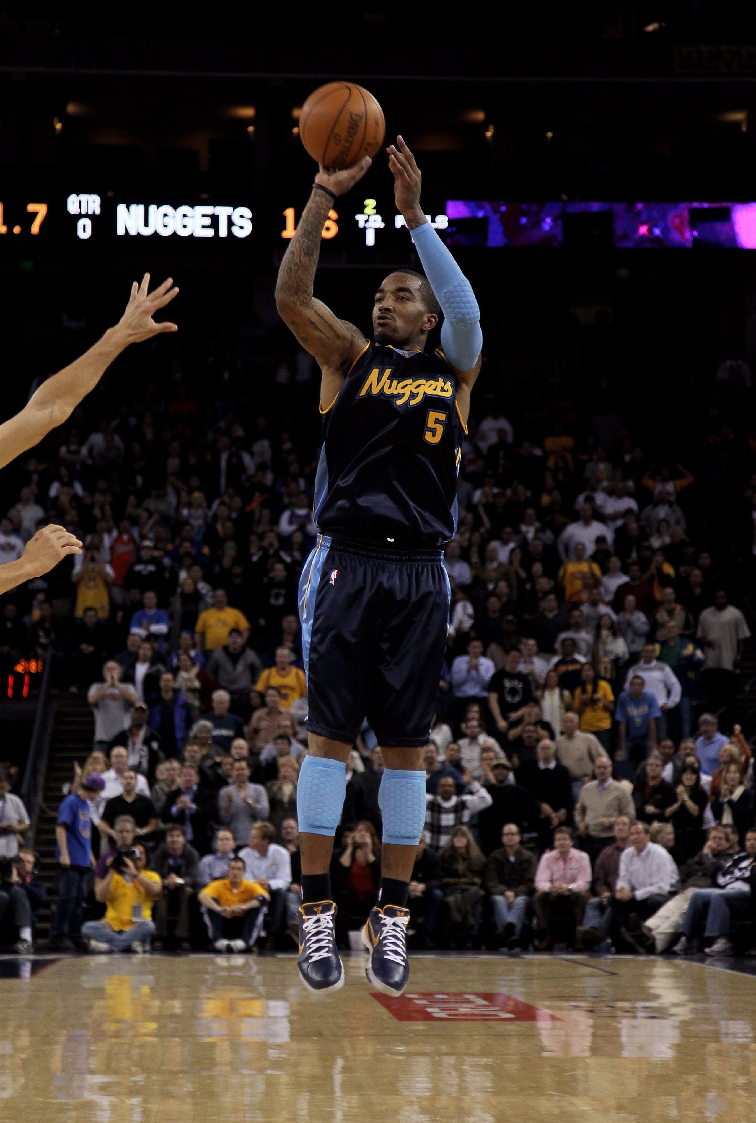 OAKLAND, CA - JANUARY 20: J.R. Smith #5 of the Denver Nuggets in action during their game against the Golden State Warriors at Oracle Arena on January 20, 2010 in Oakland, California. NOTE TO USER: User expressly acknowledges and agrees that, by downloa OAKLAND, CA - JANUARY 20: J.R. Smith #5 of the Denver Nuggets in action during their game against the Golden State Warriors at Oracle Arena on January 20, 2010 in Oakland, California. NOTE TO USER: User expressly acknowledges and agrees that, by downloa