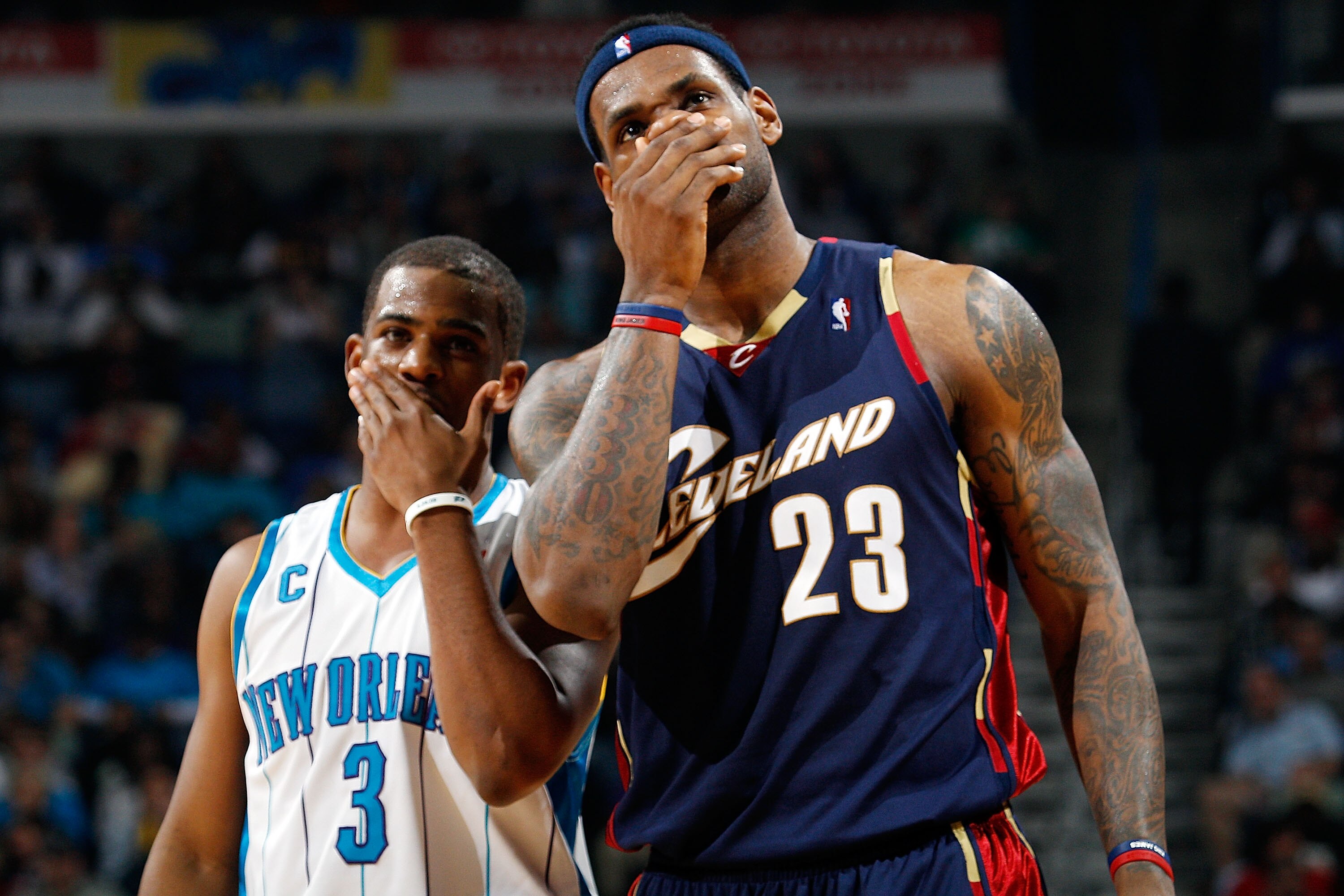 NEW ORLEANS - MARCH 24:  LeBron James #23 of the Cleveland Cavaliers talks with Chris Paul #3 of the New Orleans Hornets at the New Orleans Arena on March 24, 2010 in New Orleans, Louisiana.  The Cavaliers defeated the Hornets 105-92.  NOTE TO USER: User