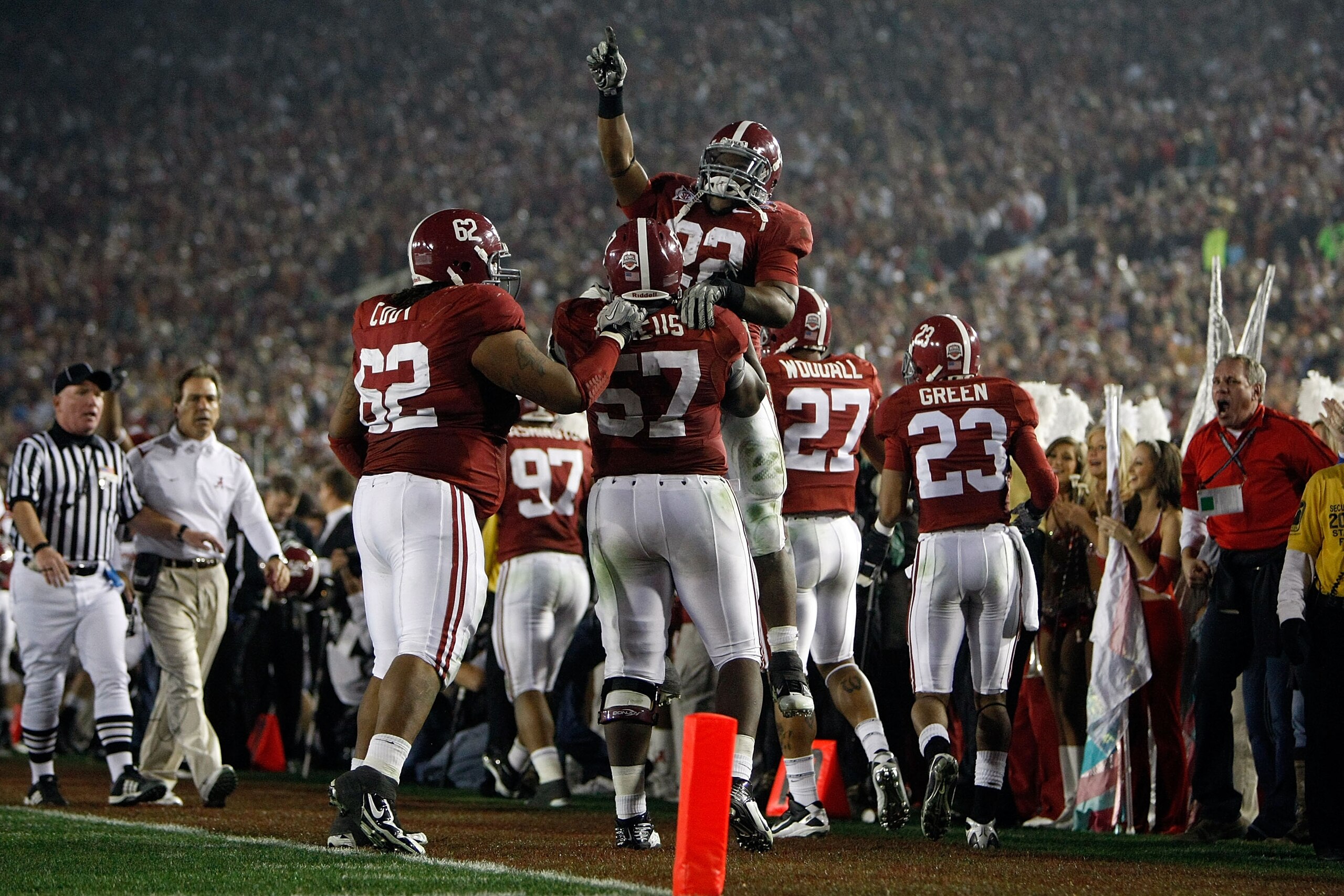 PASADENA, CA - JANUARY 07: Running back Mark Ingram #22 jumps on lineman Marcell Dareus #57 of the Alabama Crimson Tide as they celebrate with teammates after Dareus' 28-yard interception return for a touchdown against the Texas Longhorns during the seco PASADENA, CA - JANUARY 07: Running back Mark Ingram #22 jumps on lineman Marcell Dareus #57 of the Alabama Crimson Tide as they celebrate with teammates after Dareus' 28-yard interception return for a touchdown against the Texas Longhorns during the seco