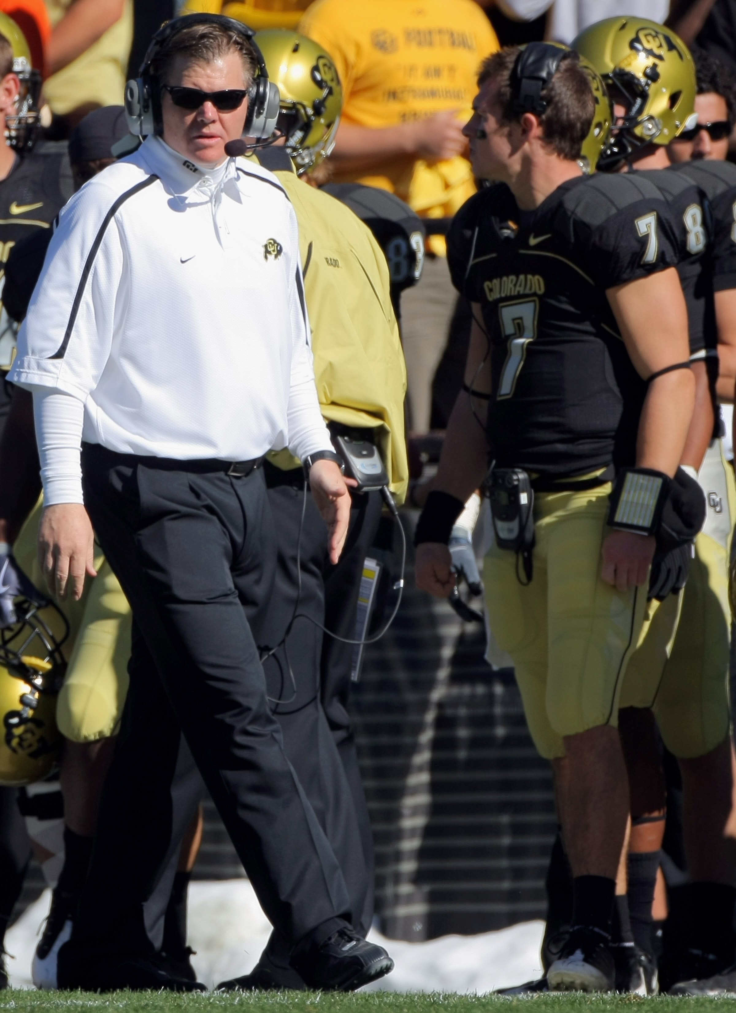 BOULDER, CO - OCTOBER 31:  Head coach Dan Hawkins of the Colorado Buffaloes leads his team against the Missouri Tigers with his son Cody Hawkins #7 on the sidelines at Folsom Field on October 31, 2009 in Boulder, Colorado. Missouri defeated Colorado 36-17