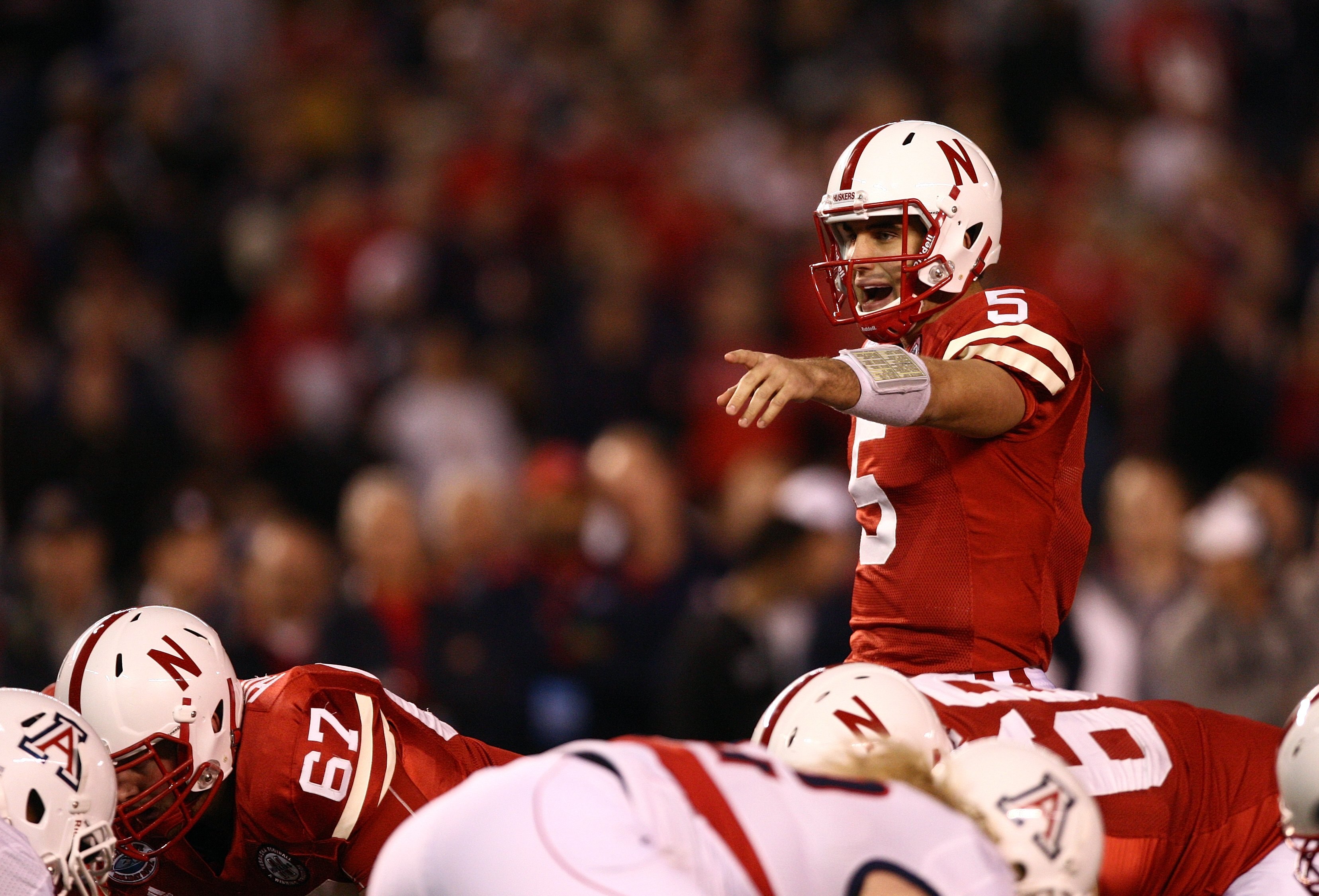 SAN DIEGO - DECEMBER 30:  Quarterback Zac Lee #5 of the University of Nebraska Cornhuskers looks at the defensive formation priro to the snap of the ball during the Pacific Life Holiday Bowl against the University of Arizona Wildcats on December 30, 2009 