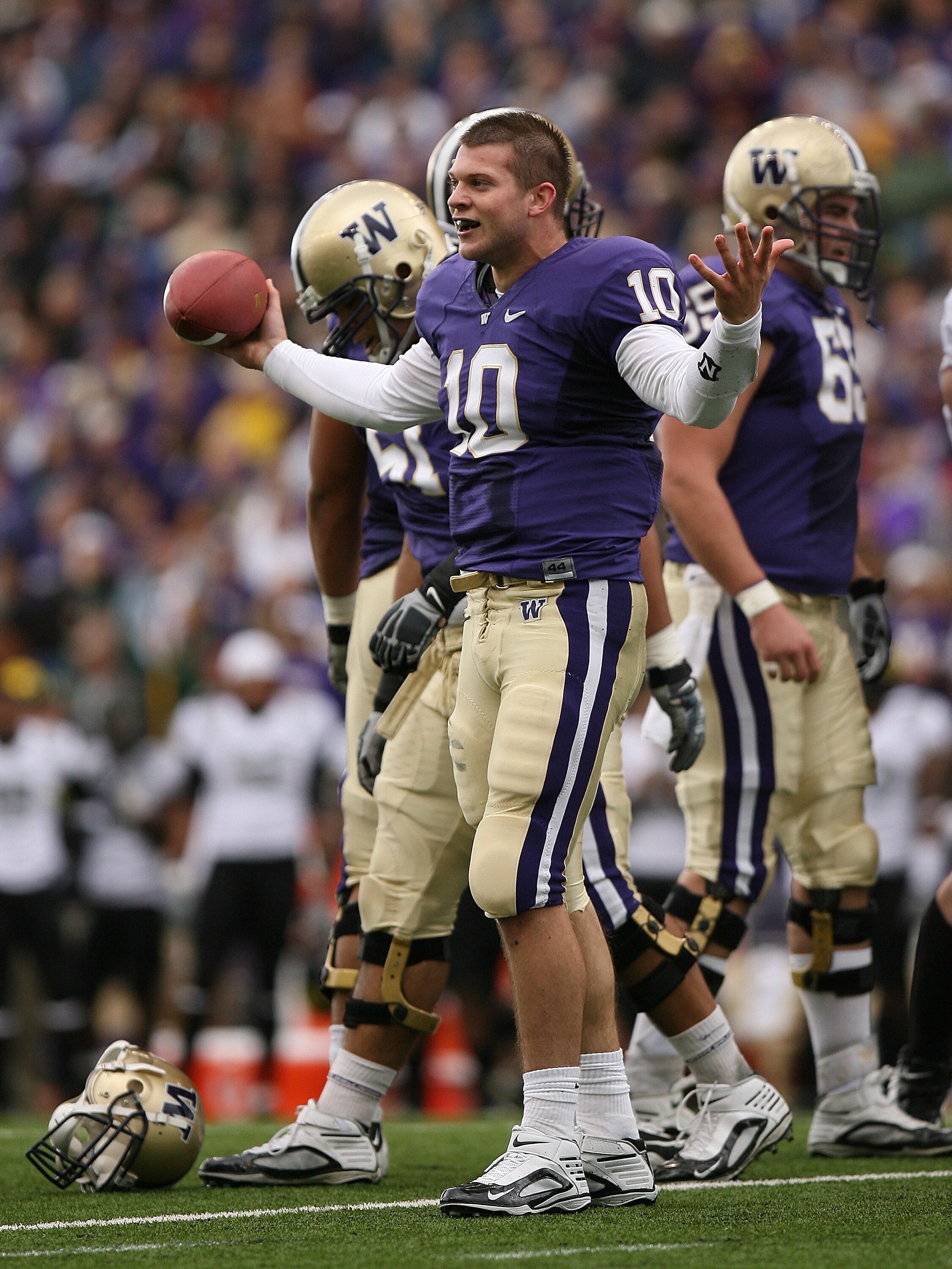 SEATTLE - OCTOBER 24:  Quarterback Jake Locker #10 of the Washington Huskies pleads for a penalty after having his helmut ripped off on a running play against the Oregon Ducks on October 24, 2009 at Husky Stadium in Seattle, Washington. No penalty was cal
