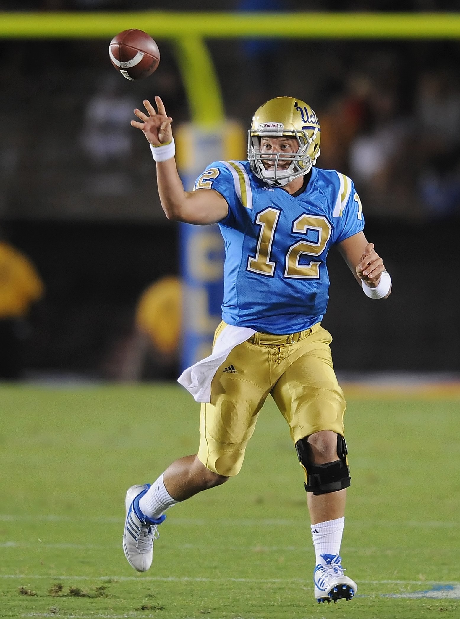 PASADENA, CA - SEPTEMBER 05:   Richard Brehaut #12 of the UCLA Bruins throws the ball against the San Diego State Aztecs at The Rose Bowl on September 5, 2009 in Pasadena, California.  (Photo by Lisa Blumenfeld/Getty Images)