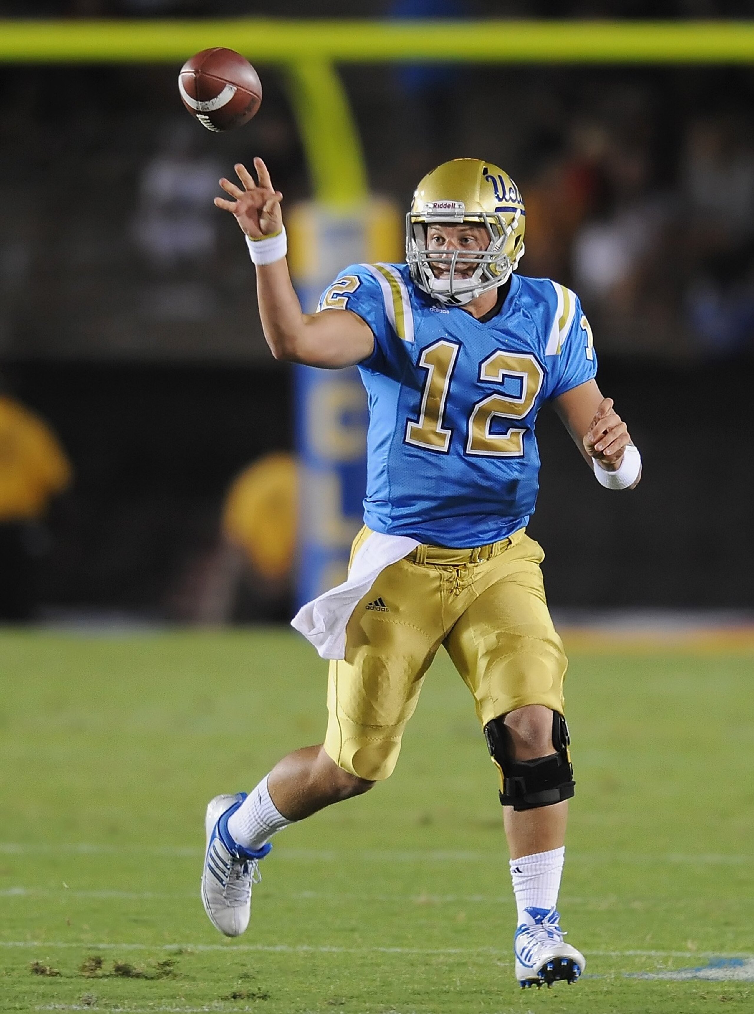 PASADENA, CA - SEPTEMBER 05:   Richard Brehaut #12 of the UCLA Bruins throws the ball against the San Diego State Aztecs at The Rose Bowl on September 5, 2009 in Pasadena, California.  (Photo by Lisa Blumenfeld/Getty Images)