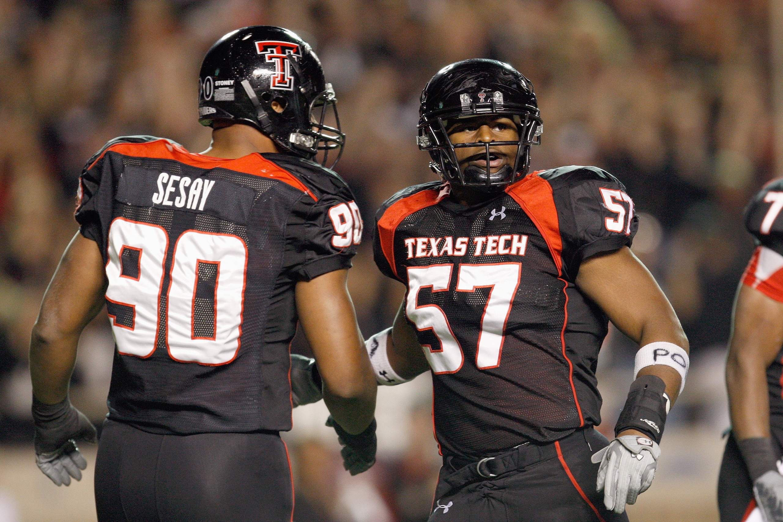 LUBBOCK, TEXAS - NOVEMBER 1:  Brian Duncan #57 and Brandon Sesay #90 of the Texas Tech Red Raiders react on the field during the game against the Texas Longhorns on November 1, 2008 at Jones Stadium in Lubbock, Texas. (Photo by: Jamie Squire/Getty Images)