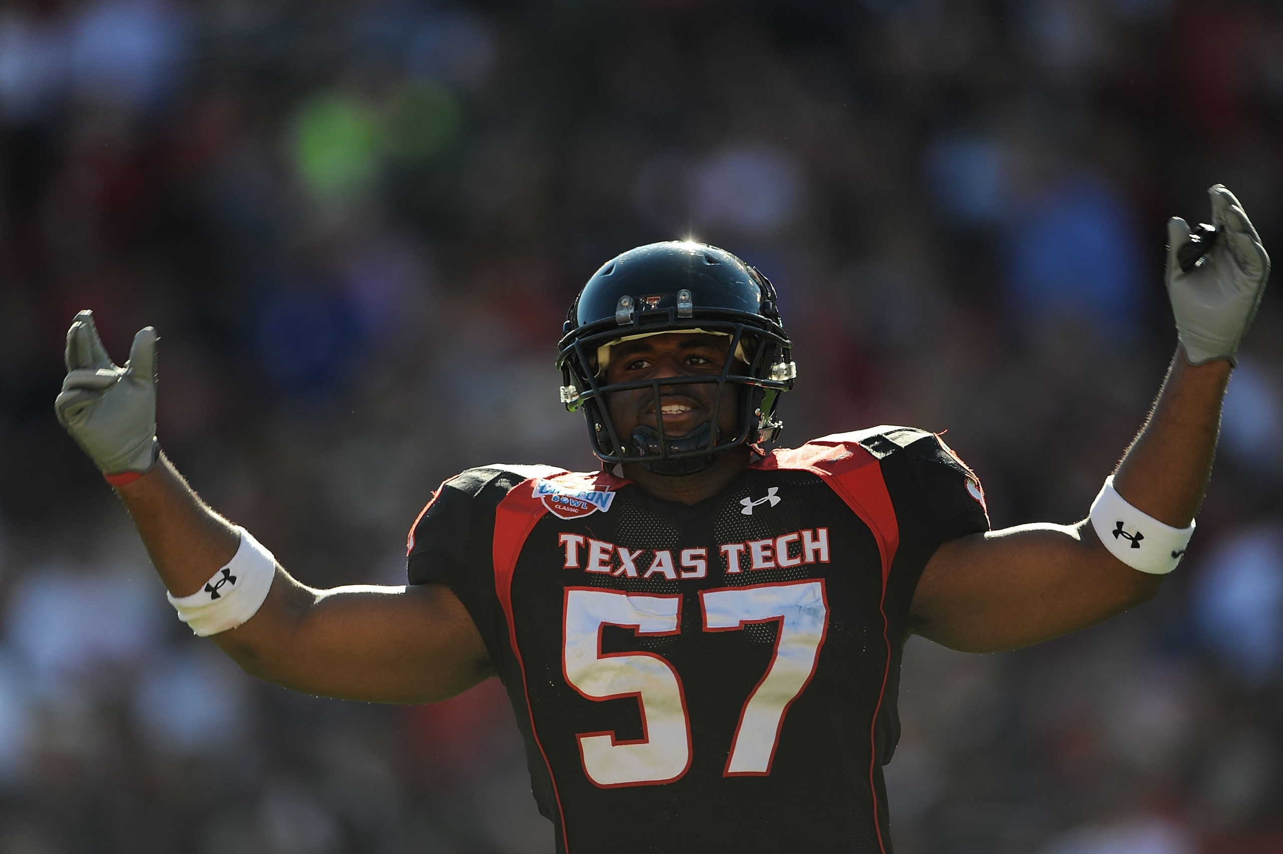 DALLAS - JANUARY 02:  Brian Duncan #57 of the Texas Tech Red Raiders during play against the Mississippi Rebels during the AT&T Cotton Bowl on January 2, 2009 at the Cotton Bowl in Dallas, Texas.  (Photo by Ronald Martinez/Getty Images)