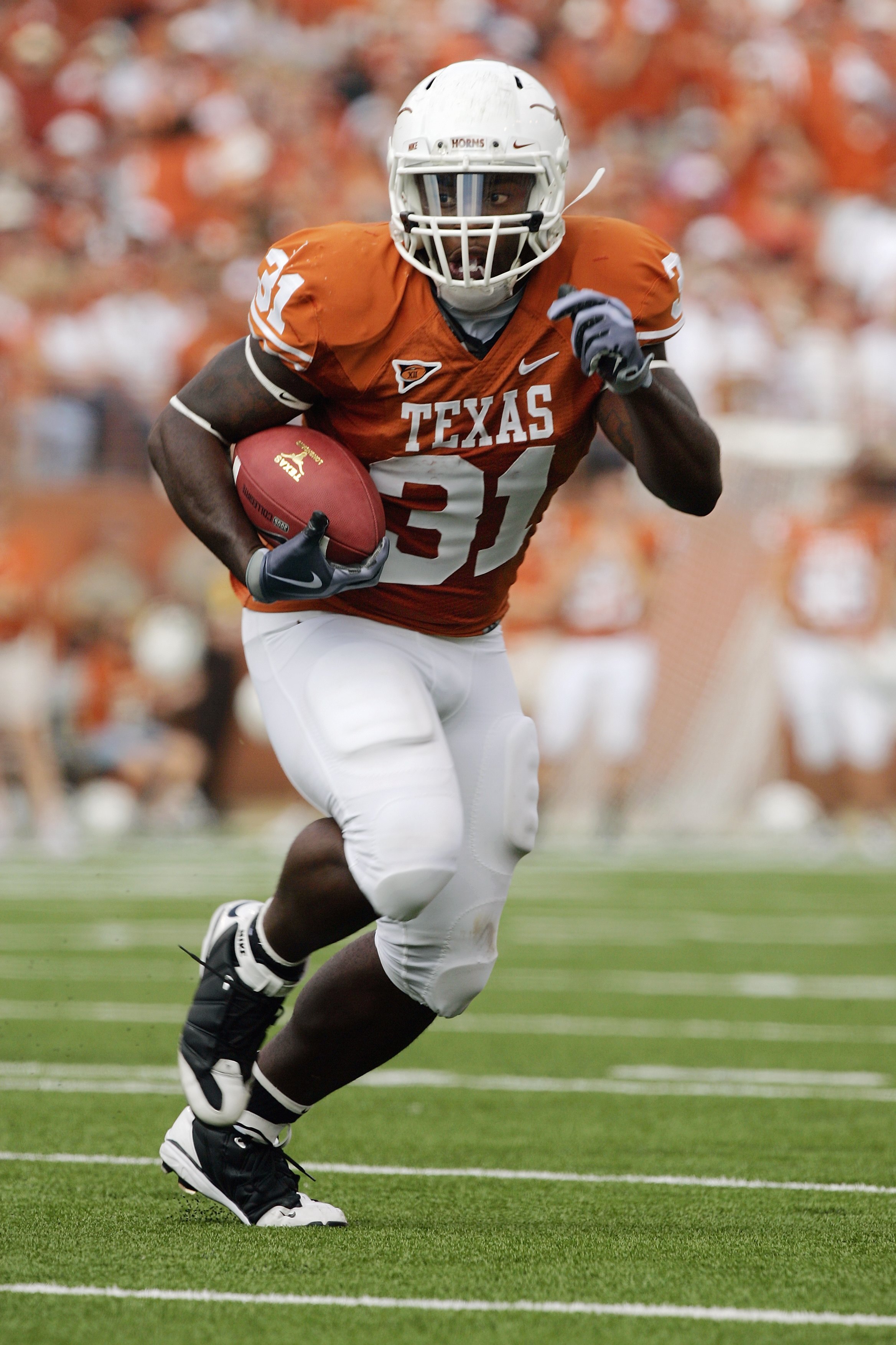 AUSTIN, TX - NOVEMBER 07:  Running back Cody Johnson #31 of the Texas Longhorns scores a touchdown against the UCF Knights on November 7, 2009 at Darrell K Royal - Texas Memorial Stadium in Austin, Texas.  Texas won 35-3.  (Photo by Brian Bahr/Getty Image