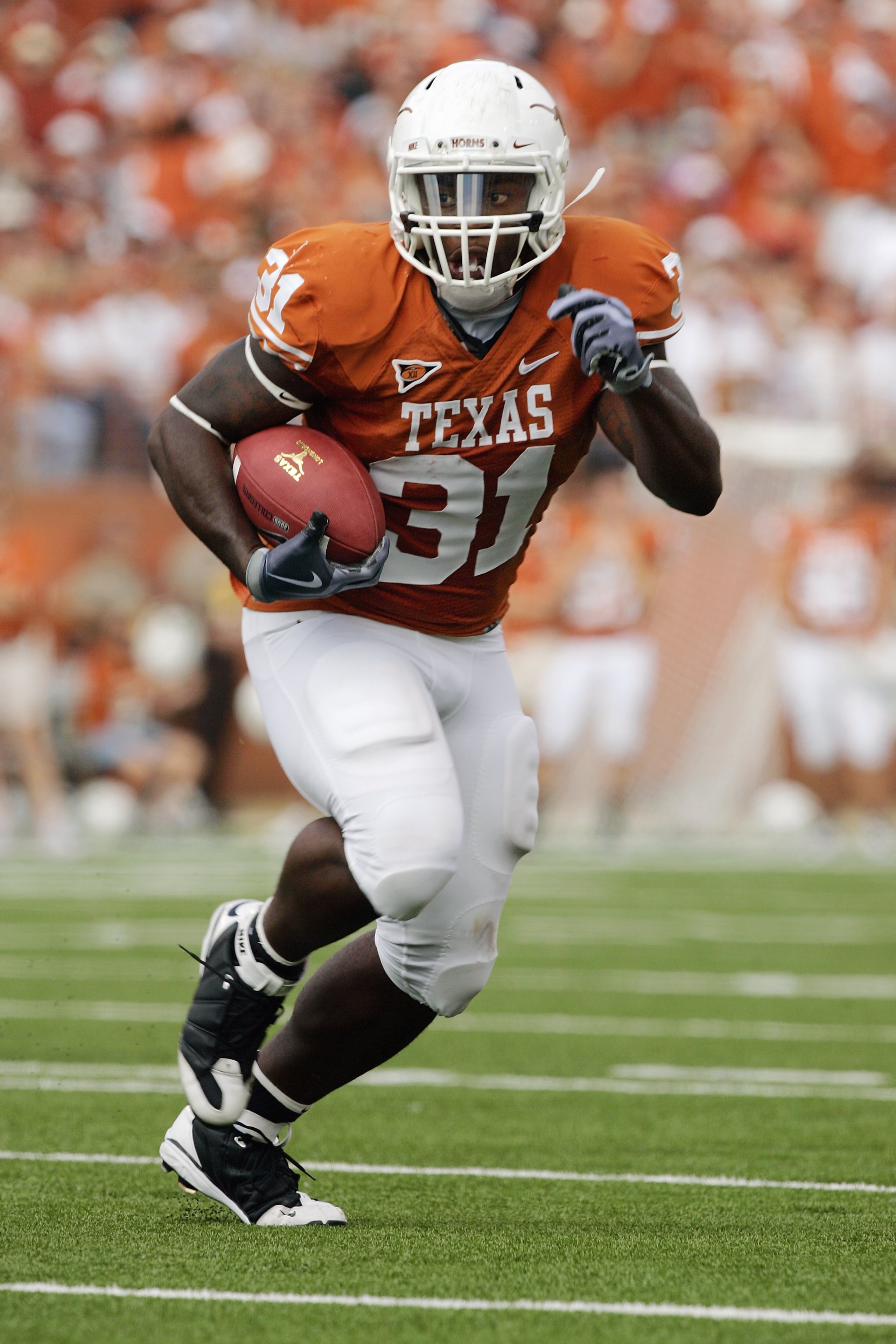 AUSTIN, TX - NOVEMBER 07:  Running back Cody Johnson #31 of the Texas Longhorns scores a touchdown against the UCF Knights on November 7, 2009 at Darrell K Royal - Texas Memorial Stadium in Austin, Texas.  Texas won 35-3.  (Photo by Brian Bahr/Getty Image