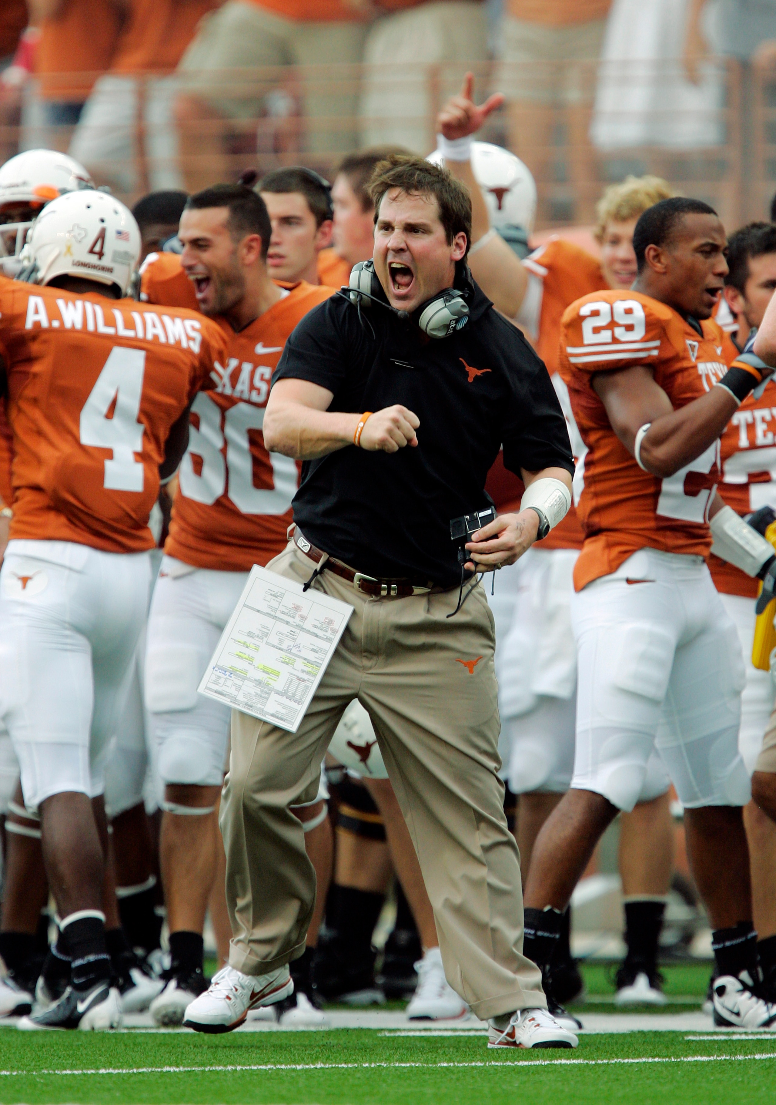 AUSTIN, TX - SEPTEMBER 5:  Defensive coordinator Will Muschamp of the Texas Longhorns gets pumped up after a turnover by the Louisiana Monroe Warhawks in the first quarter on September 5, 2009 at Darrell K Royal-Texas Memorial Stadium in Austin, Texas.  (