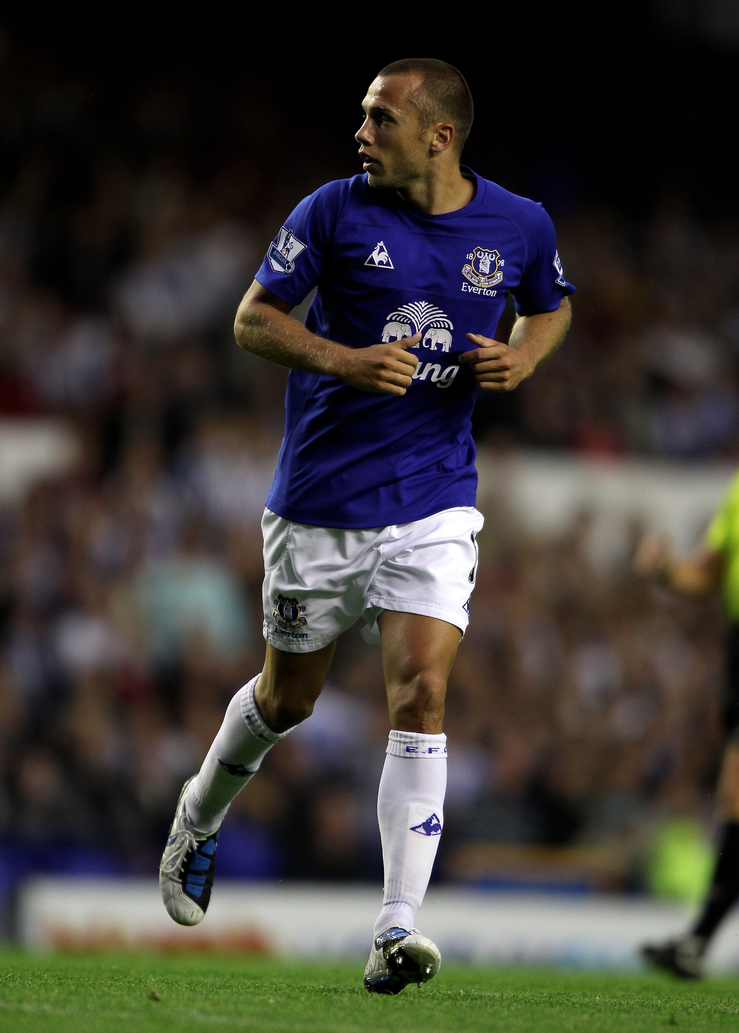 LIVERPOOL, ENGLAND - AUGUST 25: John Heitinga of Everton in action during the Carling Cup second round match between Everton and Huddersfield Town at Goodison Park on August 25, 2010 in Liverpool, England.  (Photo by Clive Brunskill/Getty Images)