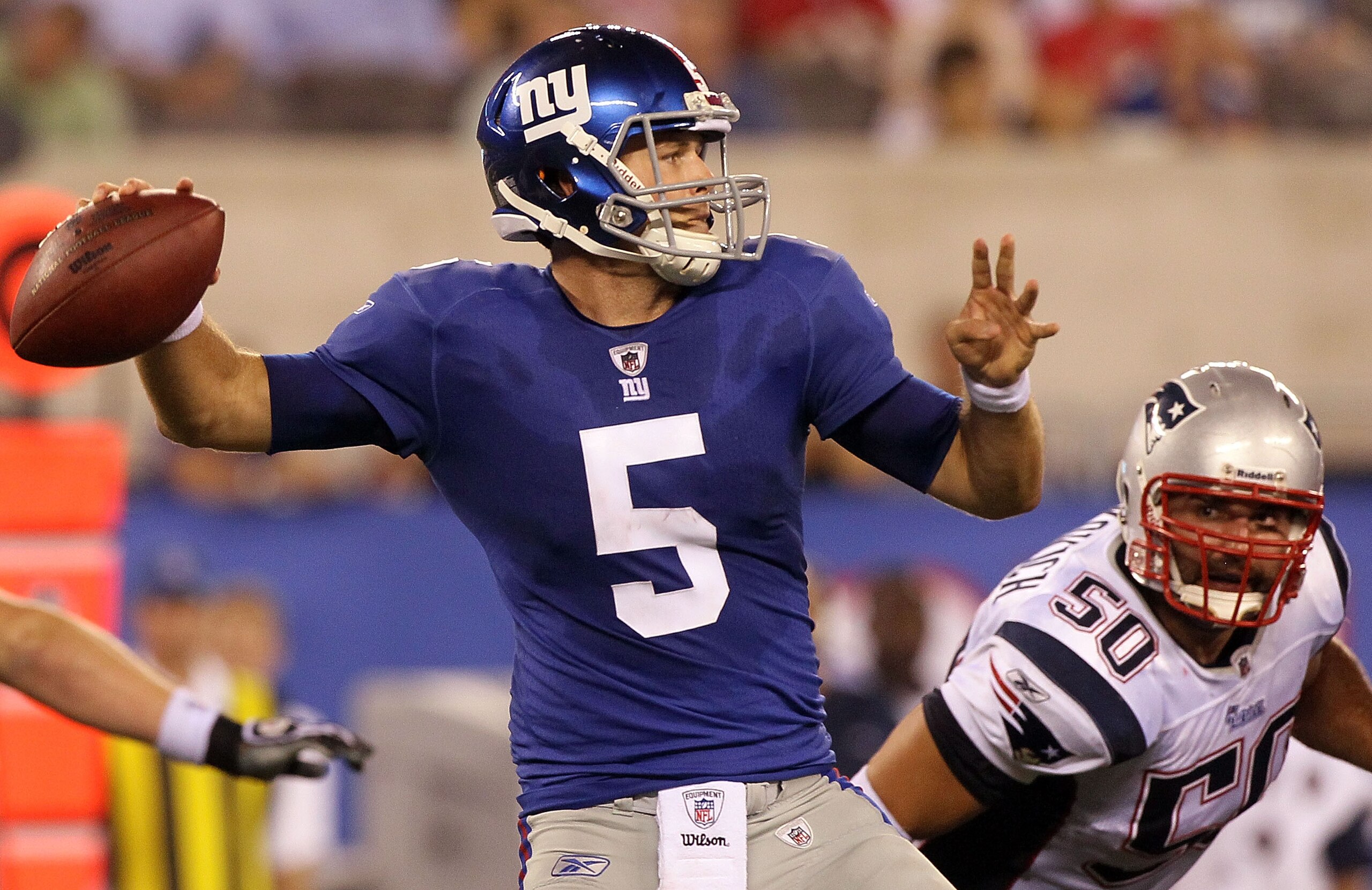 EAST RUTHERFORD, NJ - SEPTEMBER 02:  Rhett Bomar #5 of the New York Giants throws a pass against the New England Patriots on September 2, 2010 at the New Meadowlands Stadium in East Rutherford, New Jersey. The Giants defeated the Patriots 20-17.  (Photo b