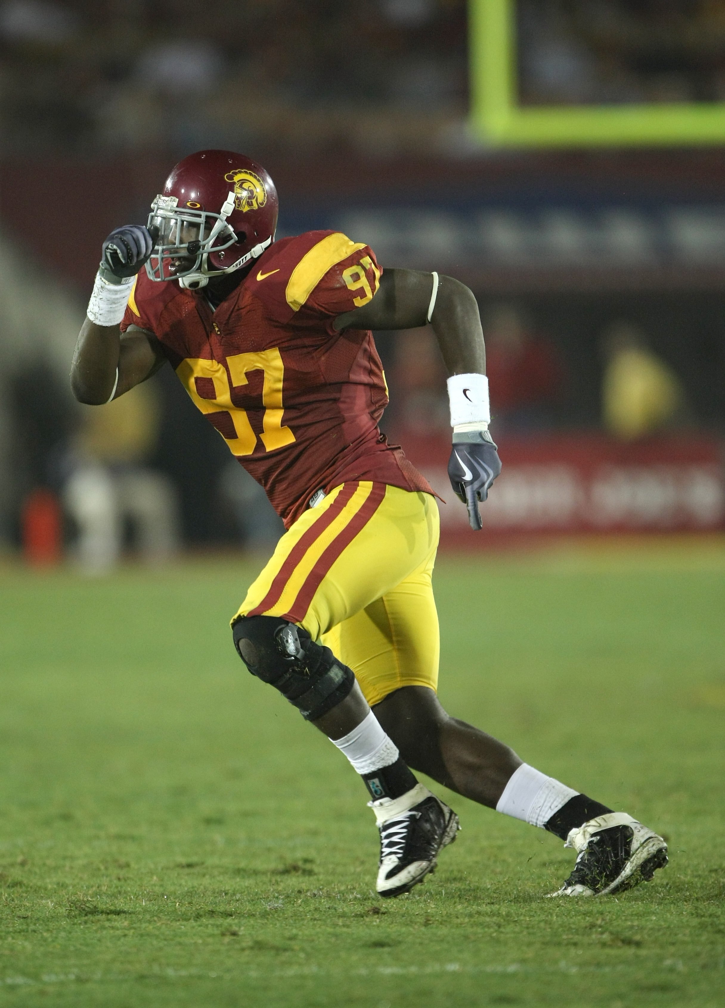 LOS ANGELES, CA - SEPTEMBER 26:  Defensive end Malik Jackson  #97 of the USC Trojans in action against the Washington State Cougars on September 23, 2009 at the Los Angeles Coliseum in Los Angeles, California.  USC won 27-6.  (Photo by Stephen Dunn/Getty