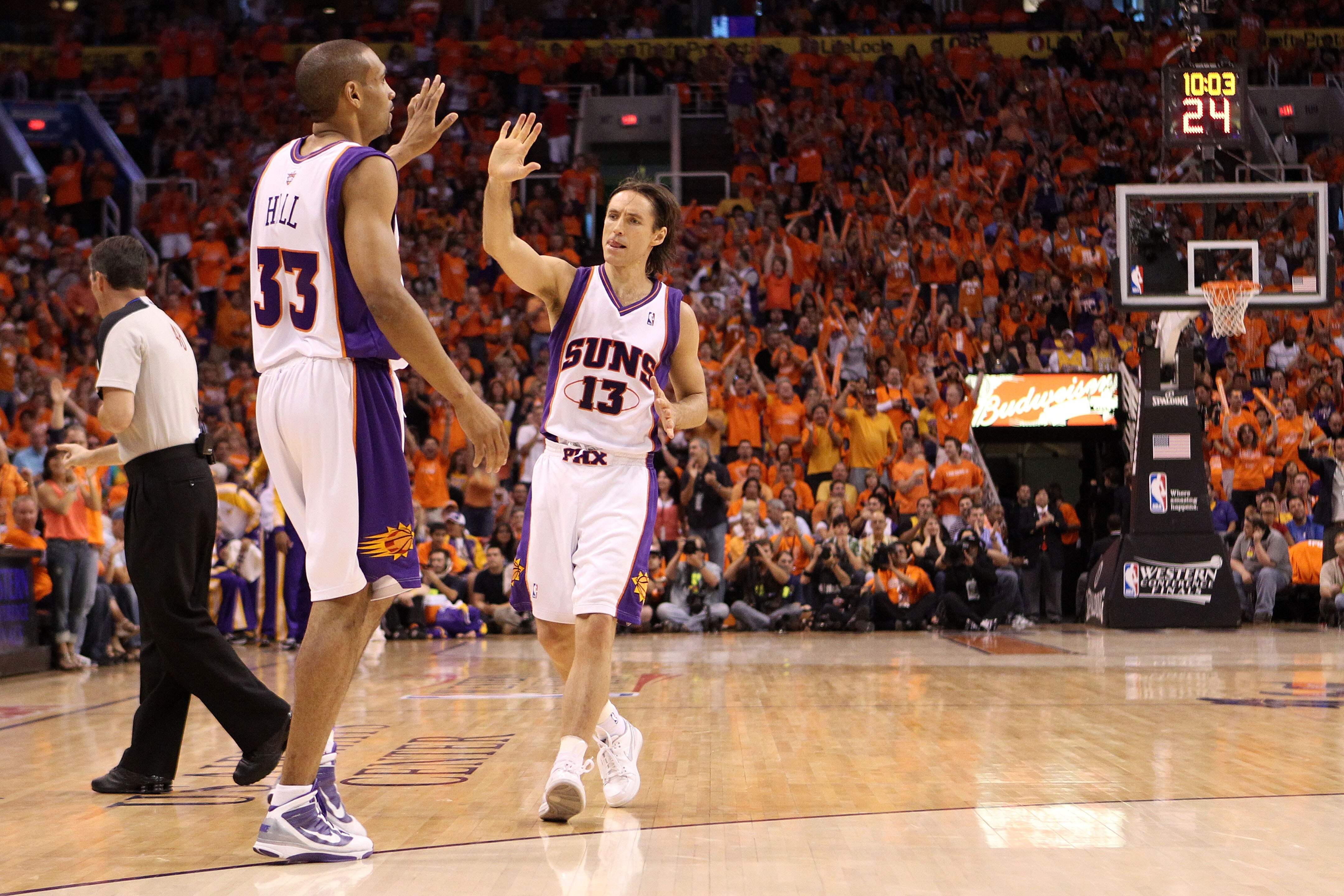 PHOENIX - MAY 29:  Steve Nash #13 and Grant Hill #33 of the Phoenix Suns celebrate after a play against the Los Angeles Lakers in the first quarter of Game Six of the Western Conference Finals during the 2010 NBA Playoffs at US Airways Center on May 29, 2