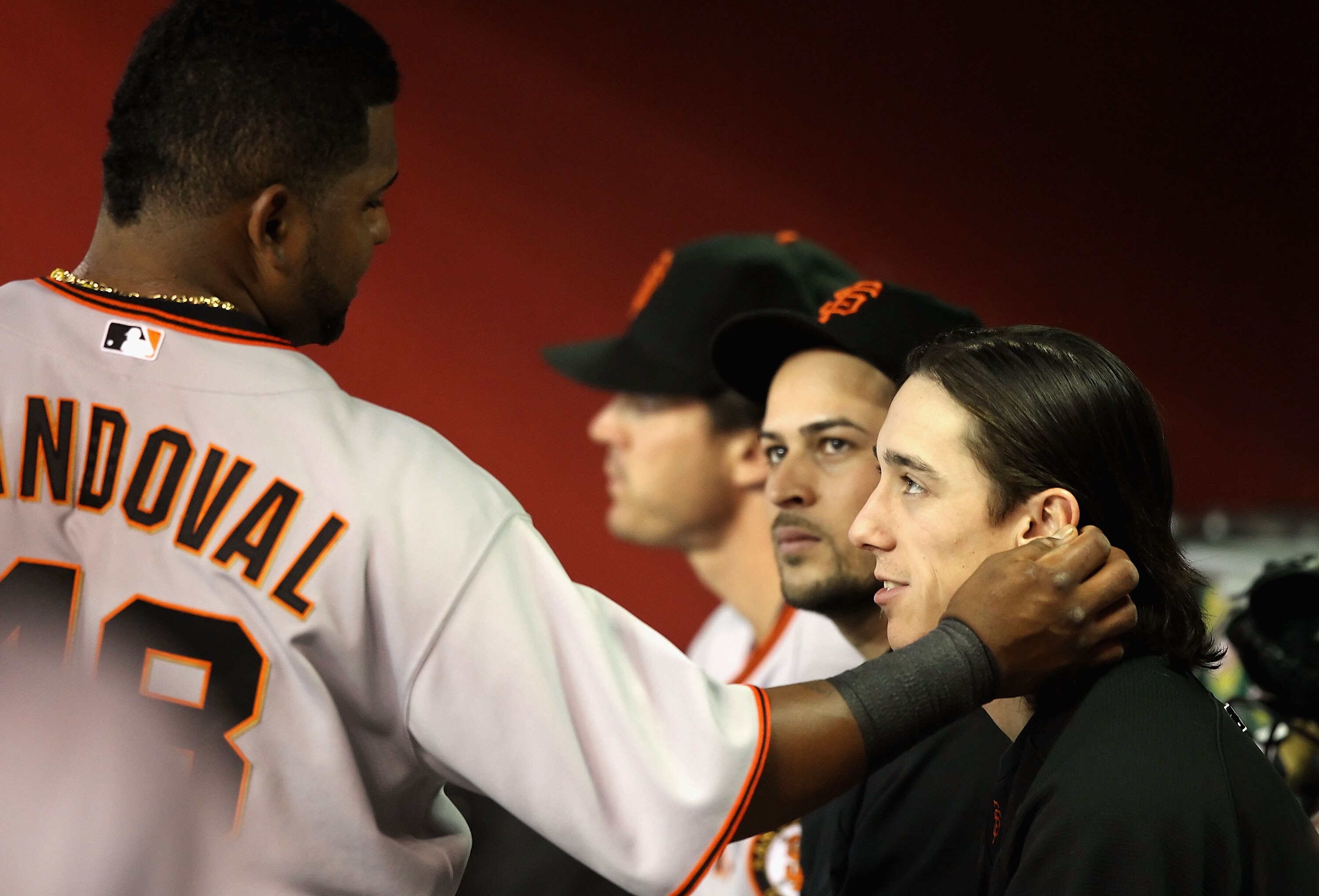 PHOENIX - MAY 19:  Pablo Sandoval #48 of the San Francisco Giants plays with the hair of pitcher Tim Lincecum #55 in the dugout during the Major League Baseball game against the Arizona Diamondbacks at Chase Field on May 19, 2010 in Phoenix, Arizona.  (Ph