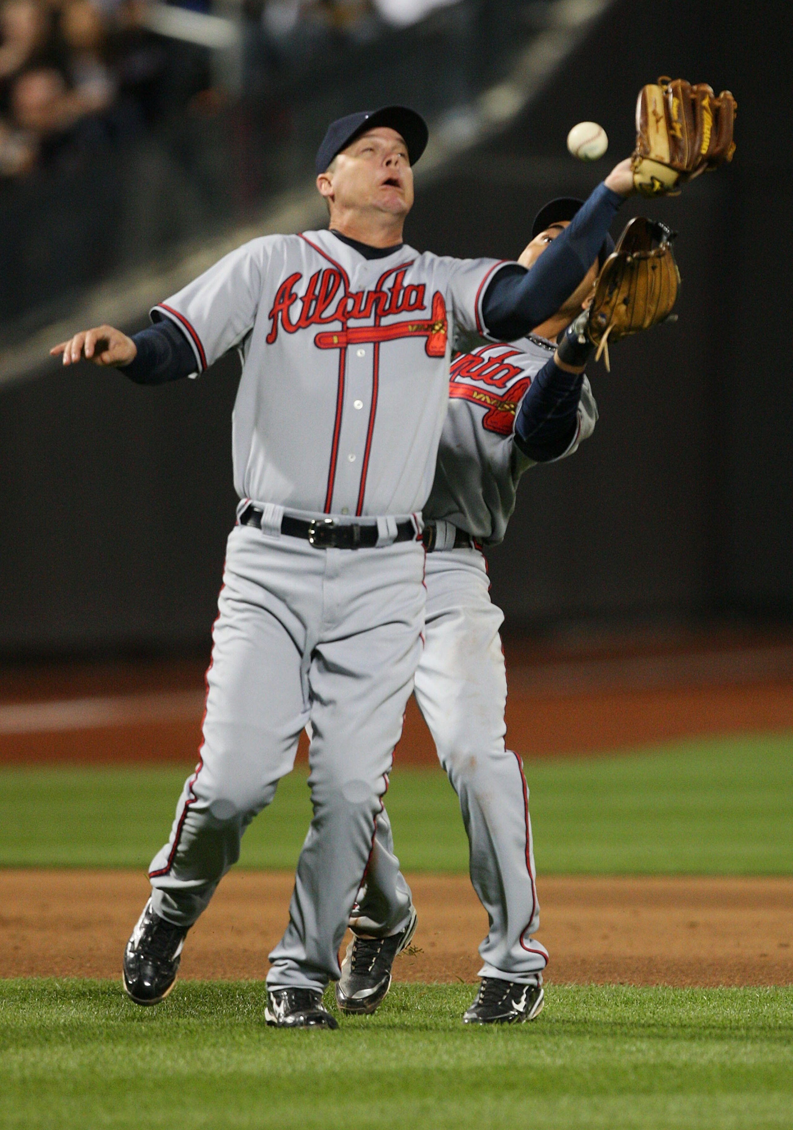 NEW YORK - APRIL 23: Chipper Jones #10 and Omar Infante #4 of the Atlanta Braves collide and drop a fly ball against the New York Mets on April 23, 2010 at Citi Field in the Flushing neighborhood of the Queens borough of New York City. (Photo by Mike Sto NEW YORK - APRIL 23: Chipper Jones #10 and Omar Infante #4 of the Atlanta Braves collide and drop a fly ball against the New York Mets on April 23, 2010 at Citi Field in the Flushing neighborhood of the Queens borough of New York City. (Photo by Mike Sto