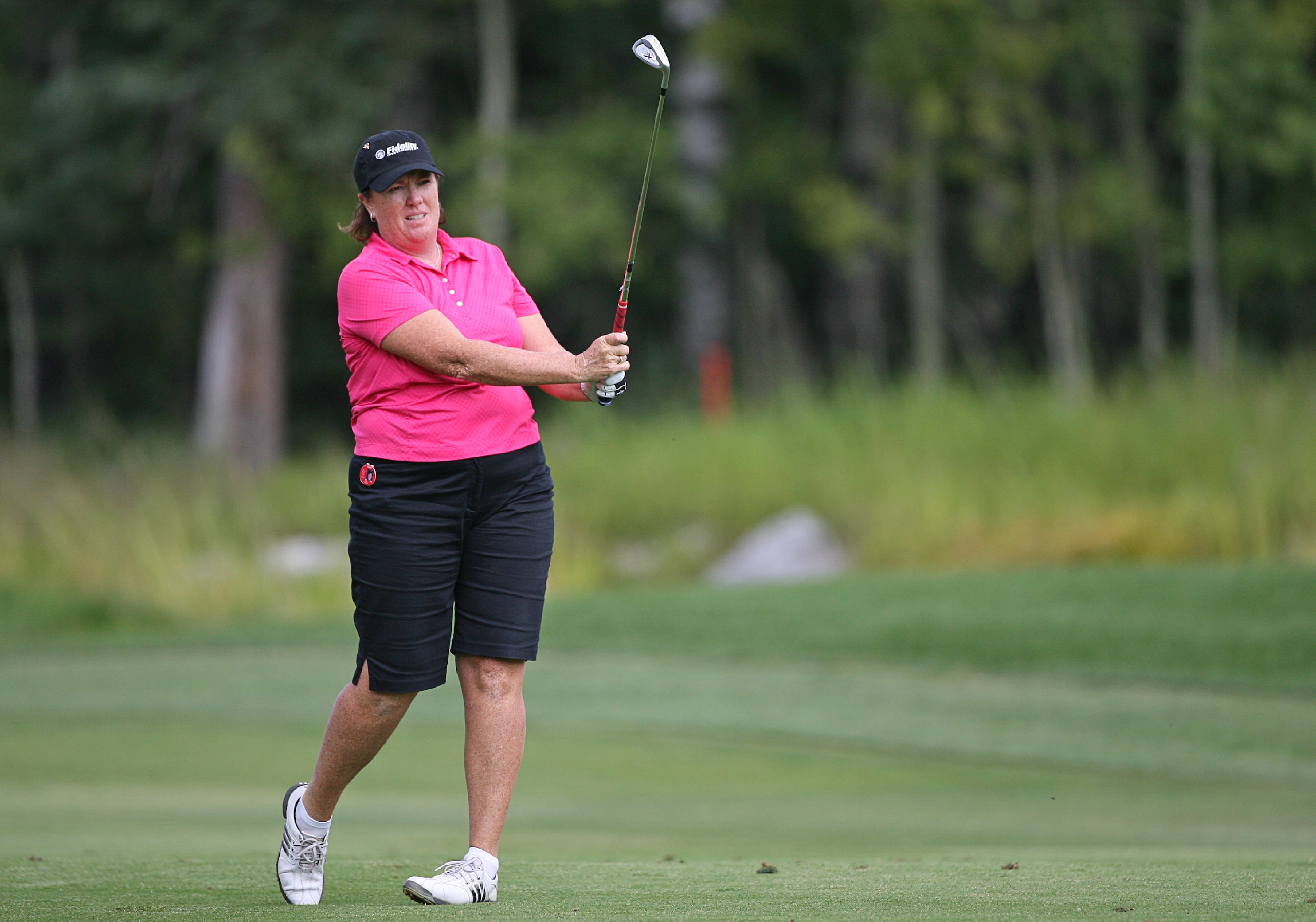 CALGARY, AB - SEPTEMBER 03: Meg Mallon of the United States watches her third shot on the ninth hole during the first round of the Canadian Women's Open at Priddis Greens Golf & Country Club on September 3, 2009 in Calgary, Alberta, Canada. (Photo by Hunt