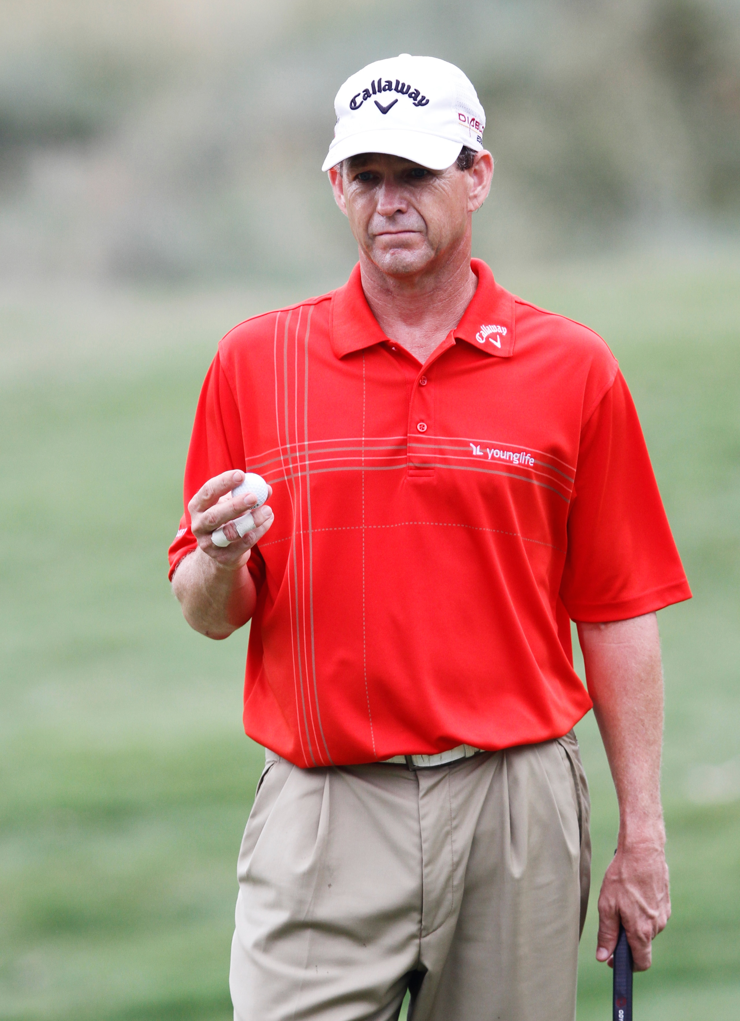 MEMPHIS, TN - JUNE 11: Lee Janzen of the United States looks over his ball before putting on the first hole during the second round of the St. Jude Classic at TPC Southwind held on June 11, 2010 in Memphis, Tennessee.  (Photo by John Sommers II/Getty Imag