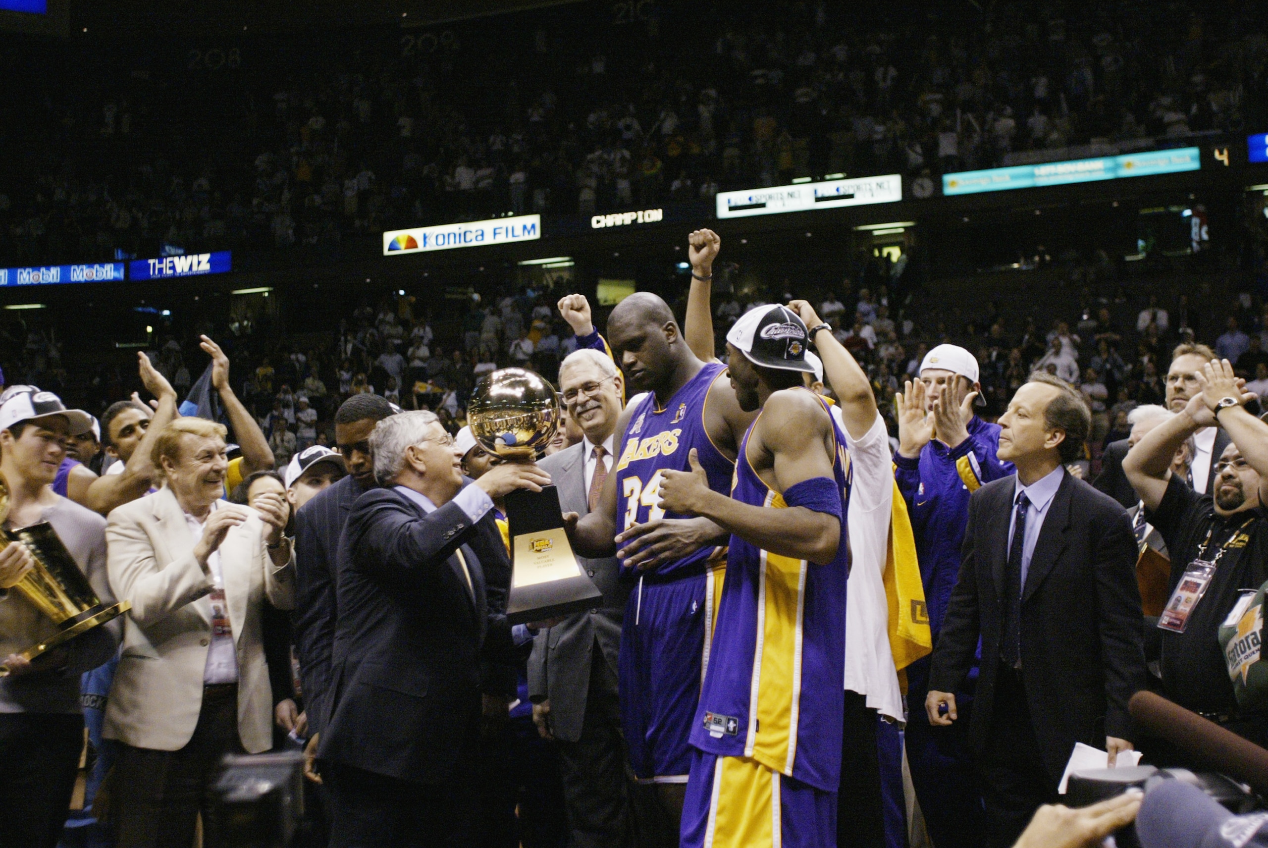 EAST RUTHERFORD, NJ - JUNE 12:  Shaquille O'Neal #34 of the Los Angeles Lakers is presented with the MVP trophy after defeating the New Jersey Nets in Game four of the 2002 NBA Finals on June 12, 2002 at Continental Airlines Arena in East Rutherford, New 