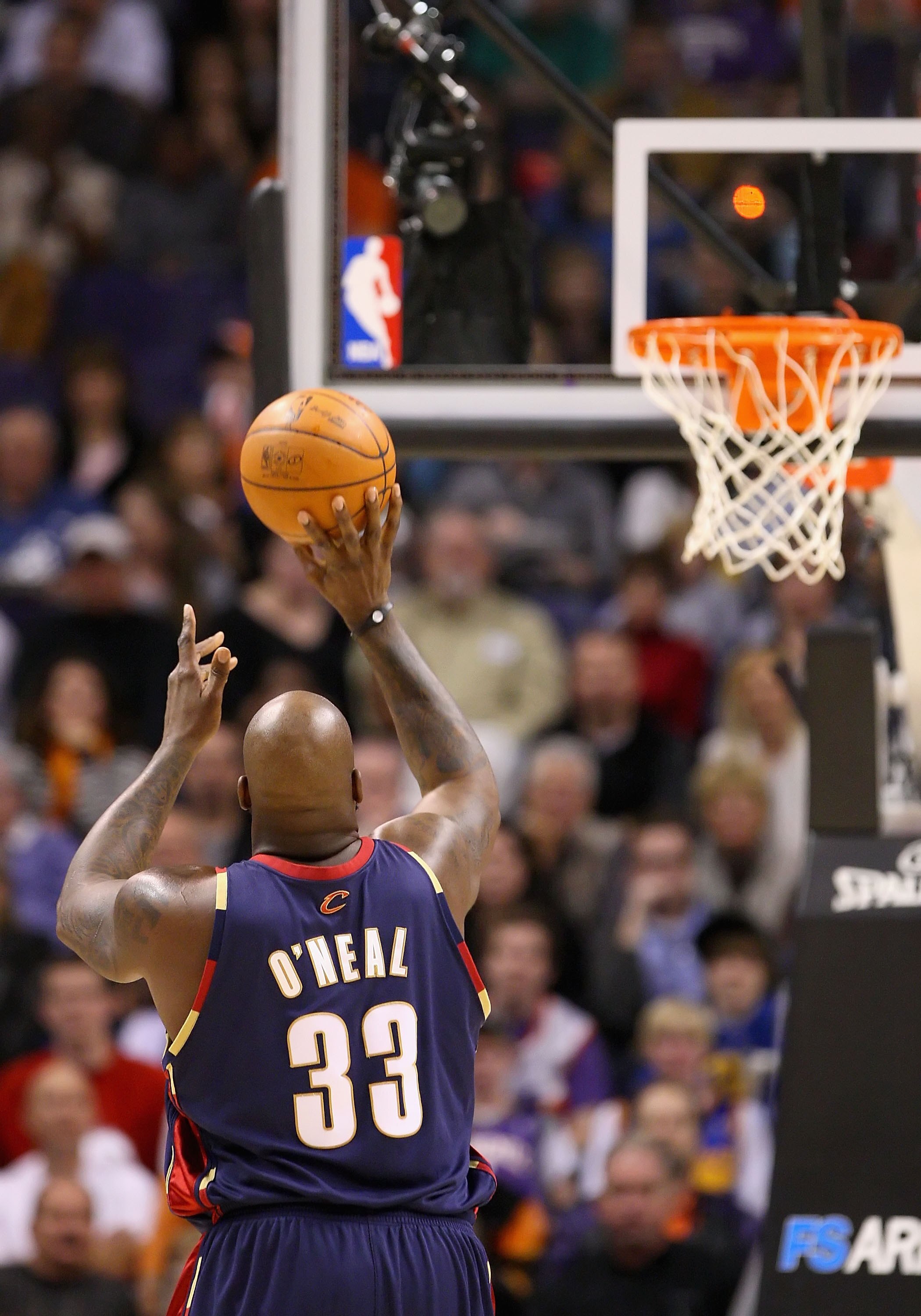 PHOENIX - DECEMBER 21:  Shaquille O'Neal #33 of the Cleveland Cavaliers shoots a free throw shot during the NBA game against of the Phoenix Suns at US Airways Center on December 21, 2009 in Phoenix, Arizona. The Cavaliers defeated the Suns 109-91.  NOTE T
