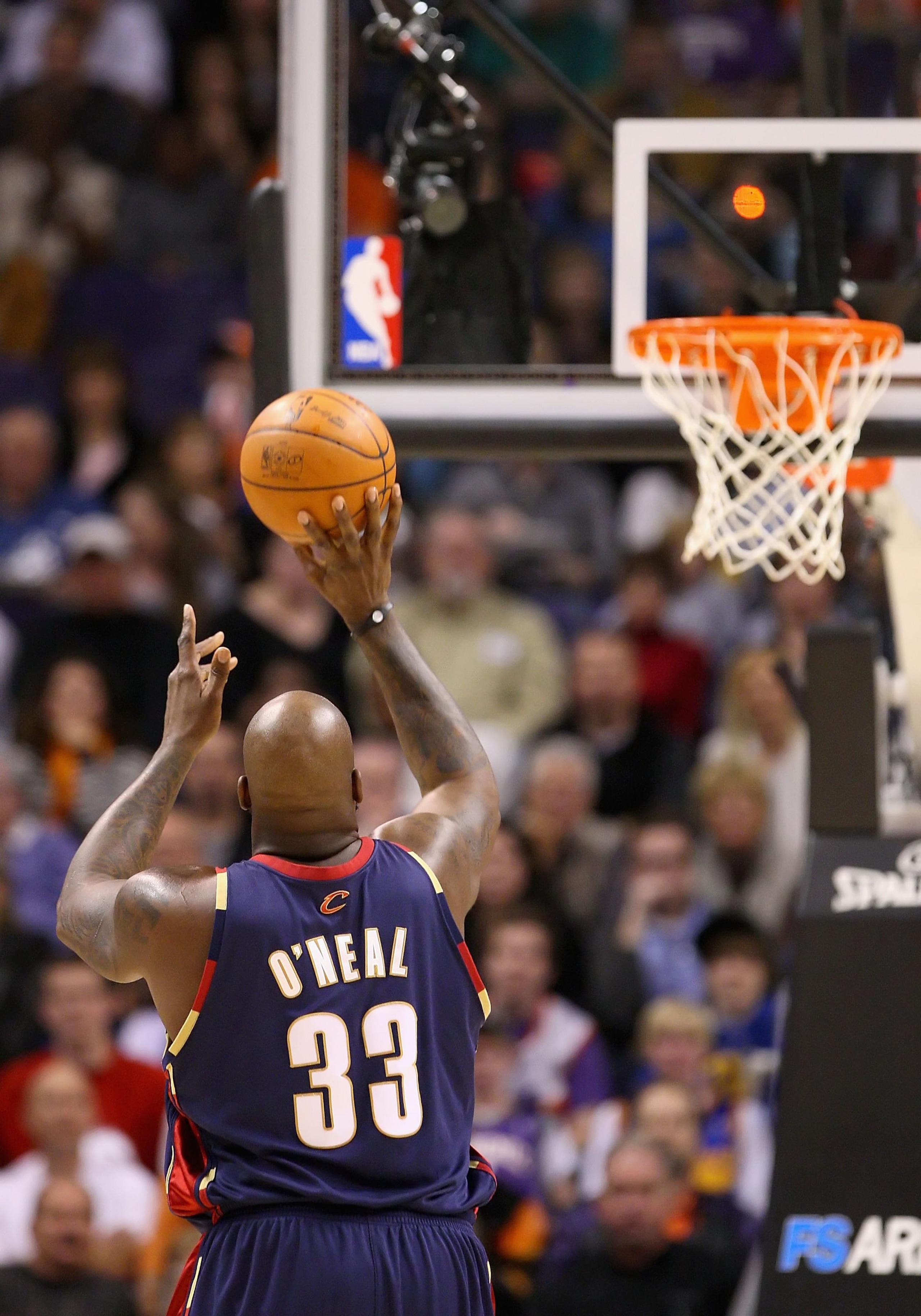 PHOENIX - DECEMBER 21:  Shaquille O'Neal #33 of the Cleveland Cavaliers shoots a free throw shot during the NBA game against of the Phoenix Suns at US Airways Center on December 21, 2009 in Phoenix, Arizona. The Cavaliers defeated the Suns 109-91.  NOTE T