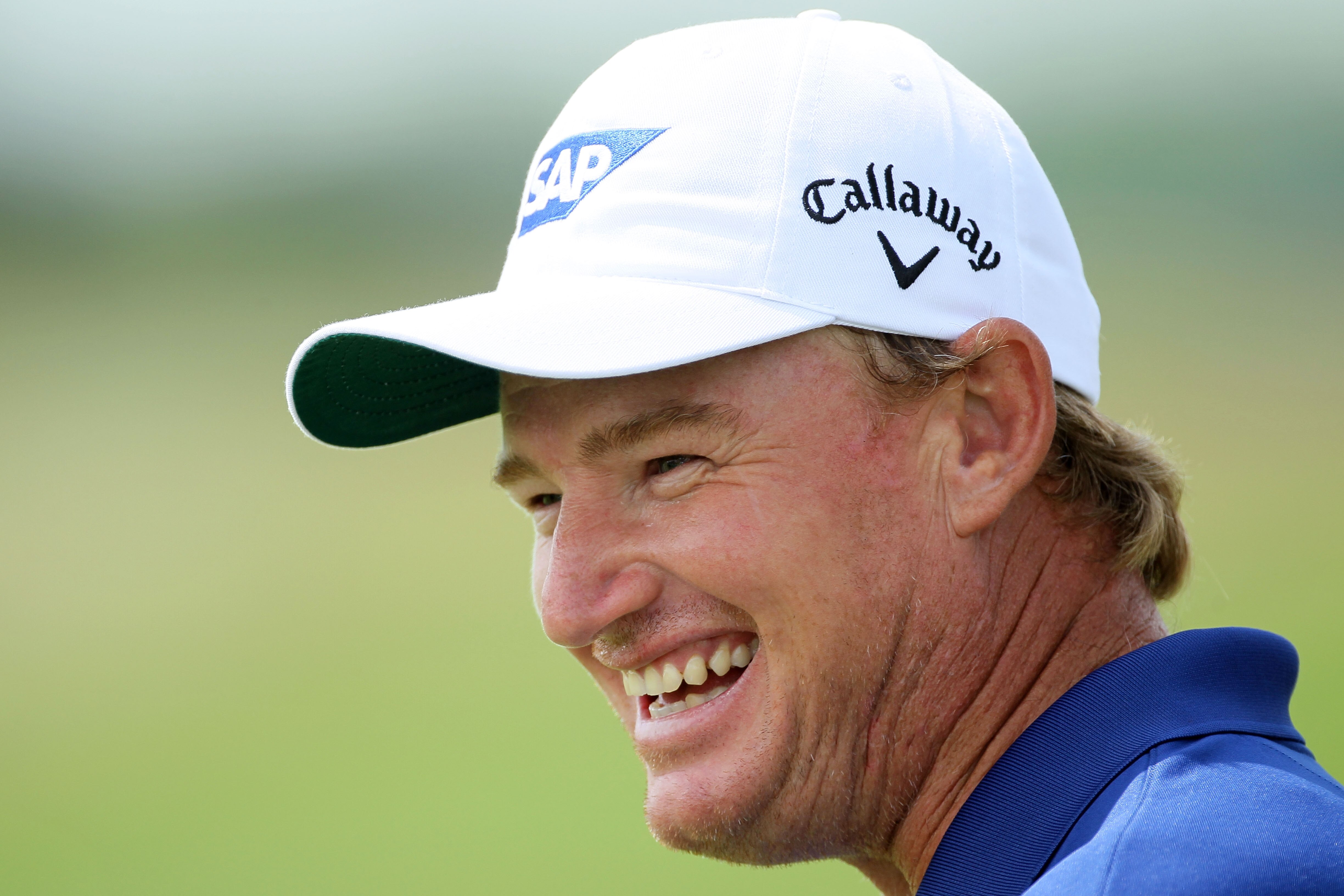 KOHLER, WI - AUGUST 11:  Ernie Els of South Africa smiles while on the practice range during a practice round prior to the start of the 92nd PGA Championship on the Straits Course at Whistling Straits on August 11, 2010 in Kohler, Wisconsin.  (Photo by An