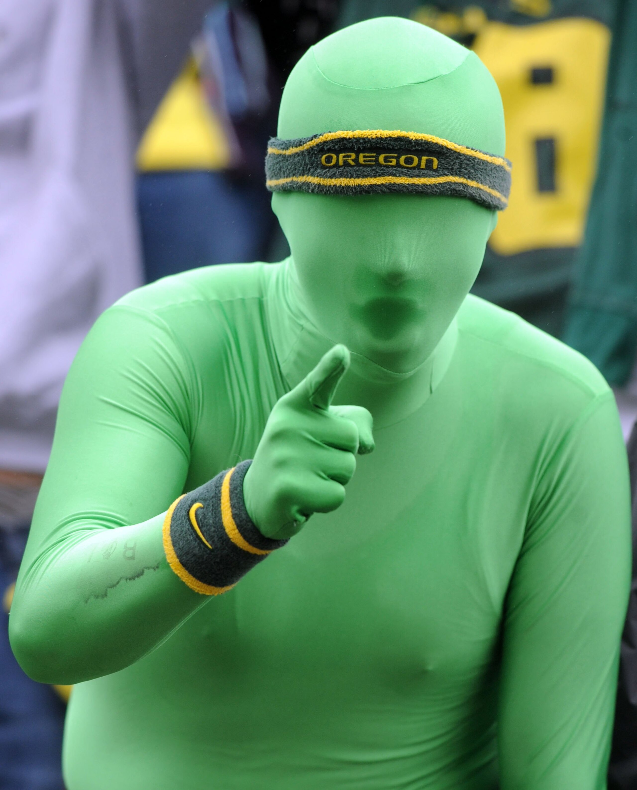 EUGENE, OR - SEPTEMBER 19: Oregon fan 'Greenman' cheers on his team in the first quarter of the game between the Utah Utes and the Oregon Ducks at Autzen Stadium on September 19, 2009 in Eugene, Oregon. Oregon won the game 31-24. (Photo by Steve Dykes/Get
