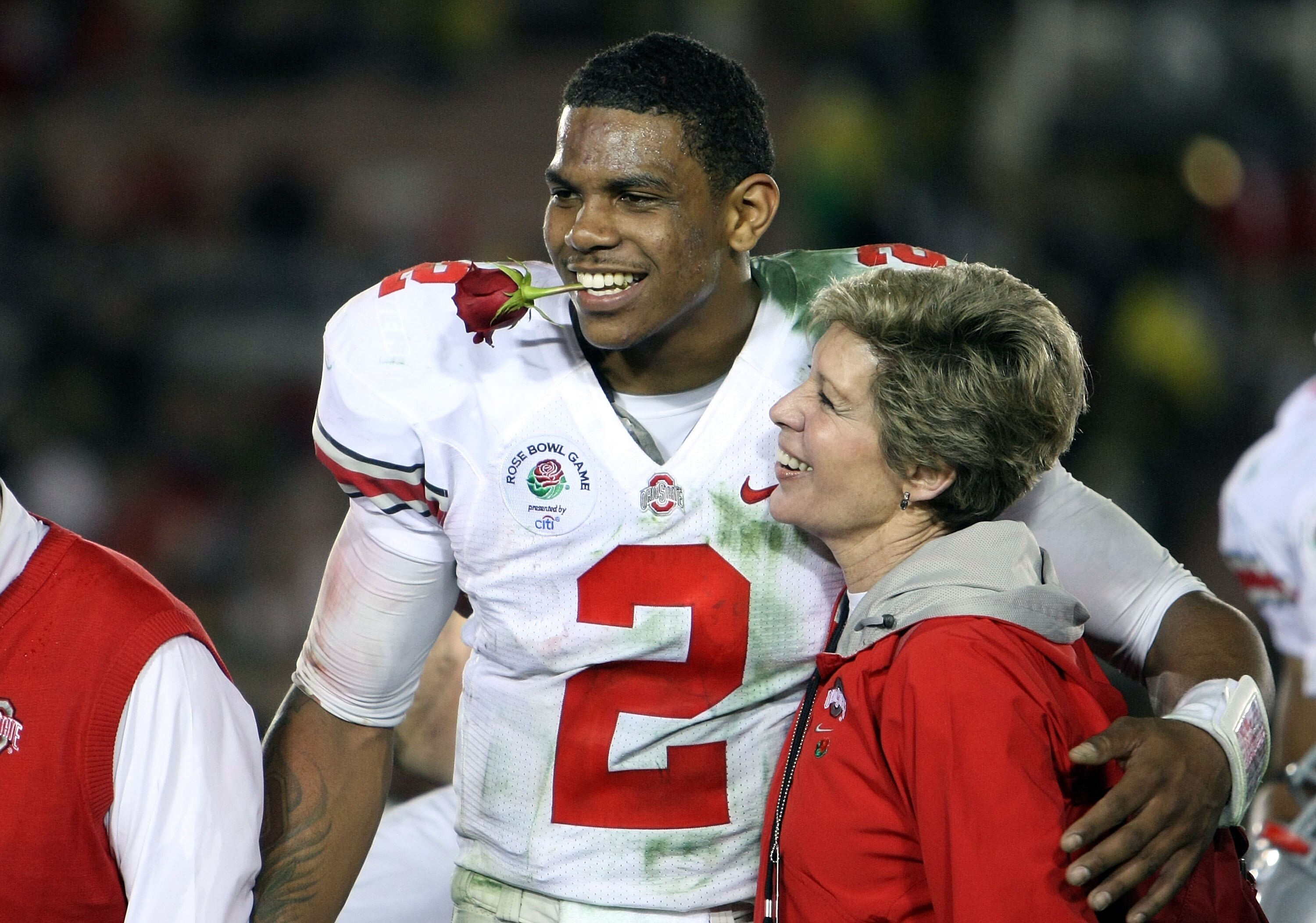 PASADENA, CA - JANUARY 01:  Quarterback Terrelle Pryor #2 of the Ohio State Buckeyes celebrates with Ellen Tressel after the buckeyes 26-17 win in the 96th Rose Bowl game over the Oregon Ducks on January 1, 2010 in Pasadena, California.  (Photo by Stephen
