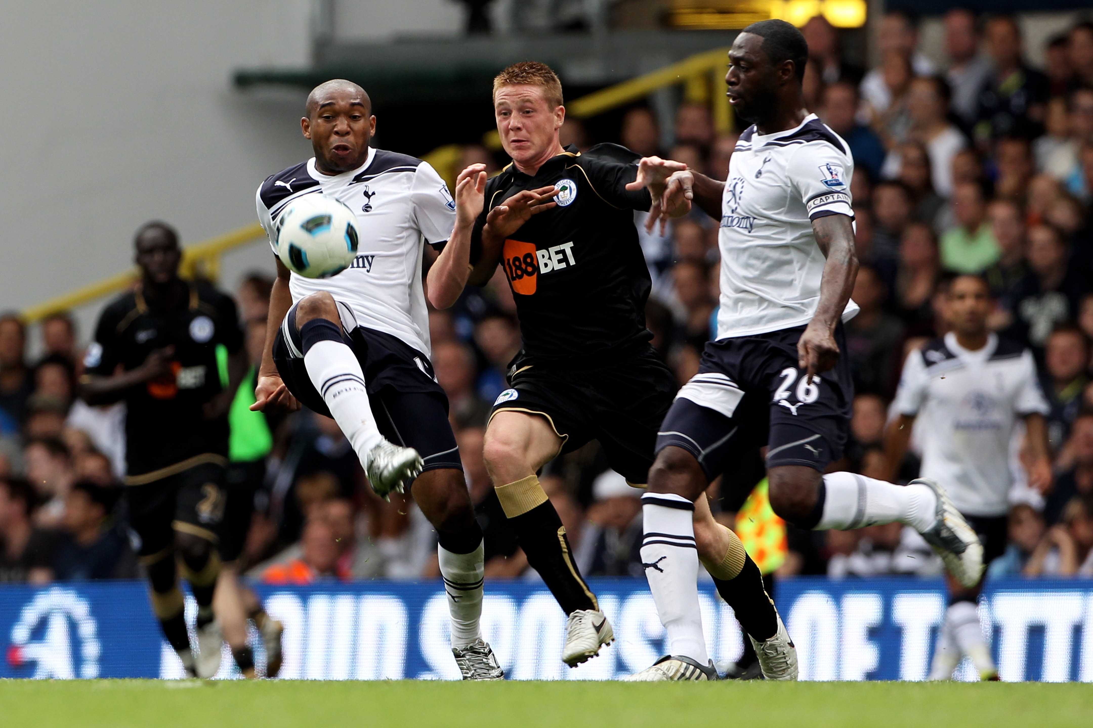 LONDON, ENGLAND - AUGUST 28:  Wilson Palacios (L) and Ledley King (R) of Tottenham battle for the ball with James McCarthy of Wigan during the Barclays Premier League match between Tottenham Hotspur and Wigan Athletic at White Hart Lane on August 28, 2010