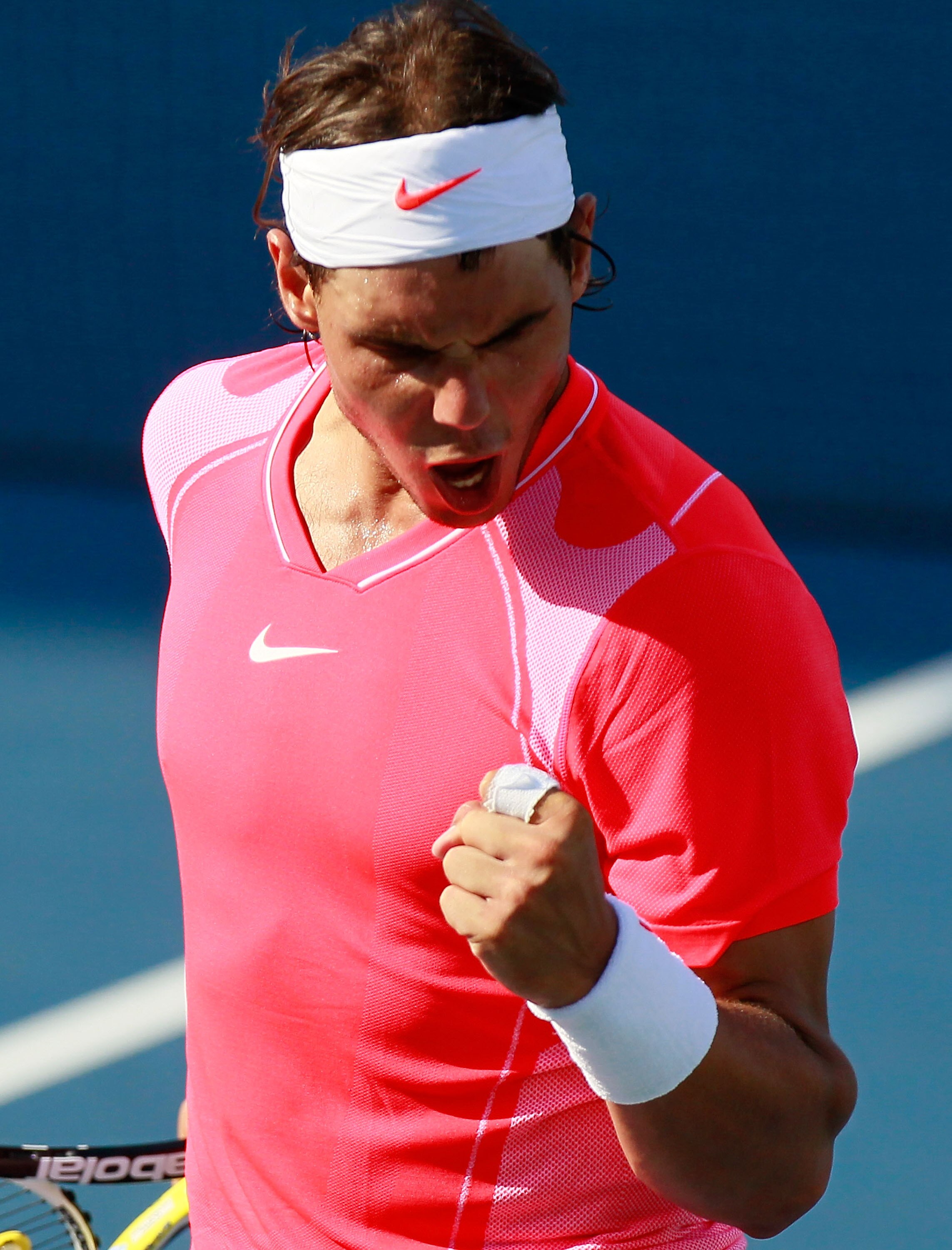 CINCINNATI - AUGUST 19:  Rafael Nadal of Spain reacts after winning a point in his second set tiebreaker against Julien Benneteau of France during Day 4 of the Western & Southern Financial Group Masters at the Lindner Family Tennis Center on August 19, 20
