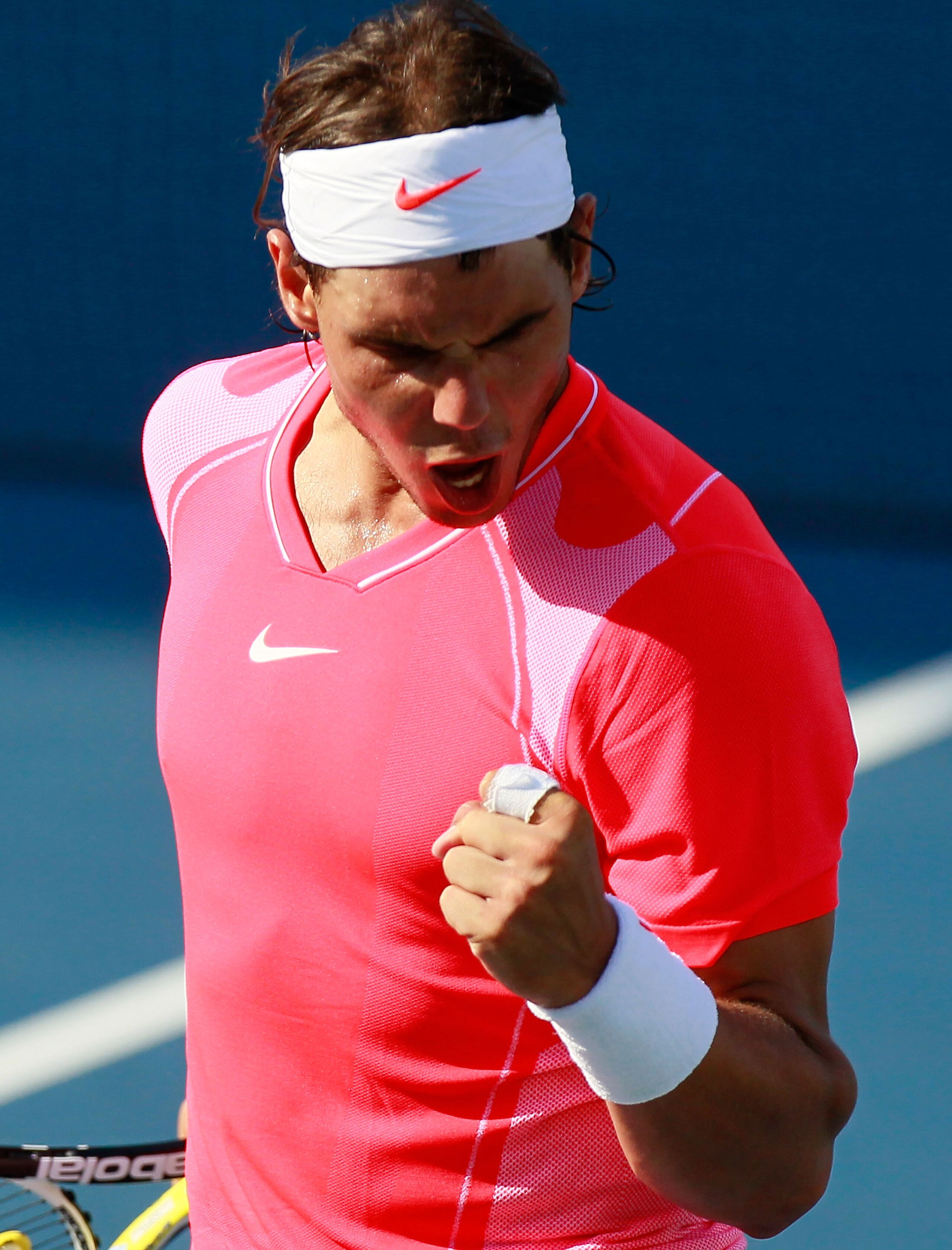 CINCINNATI - AUGUST 19:  Rafael Nadal of Spain reacts after winning a point in his second set tiebreaker against Julien Benneteau of France during Day 4 of the Western & Southern Financial Group Masters at the Lindner Family Tennis Center on August 19, 20