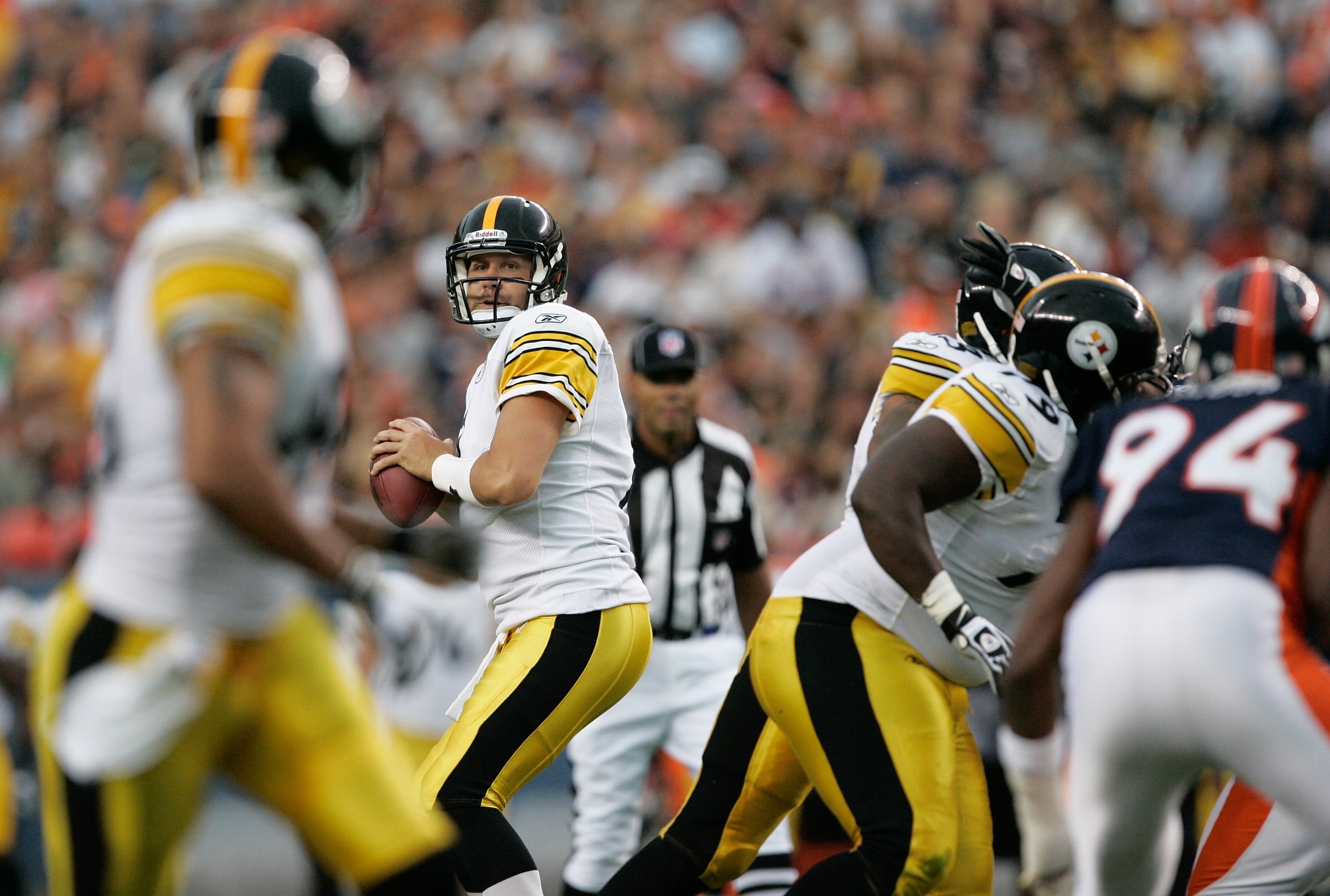DENVER - AUGUST 29: Quarterback Ben Roethlisberger #7 of the Pittsburgh Steelers drops back to pass against the Denver Broncos at INVESCO Field at Mile High on August 29, 2010 in Denver, Colorado. (Photo by Justin Edmonds/Getty Images) DENVER - AUGUST 29: Quarterback Ben Roethlisberger #7 of the Pittsburgh Steelers drops back to pass against the Denver Broncos at INVESCO Field at Mile High on August 29, 2010 in Denver, Colorado. (Photo by Justin Edmonds/Getty Images)