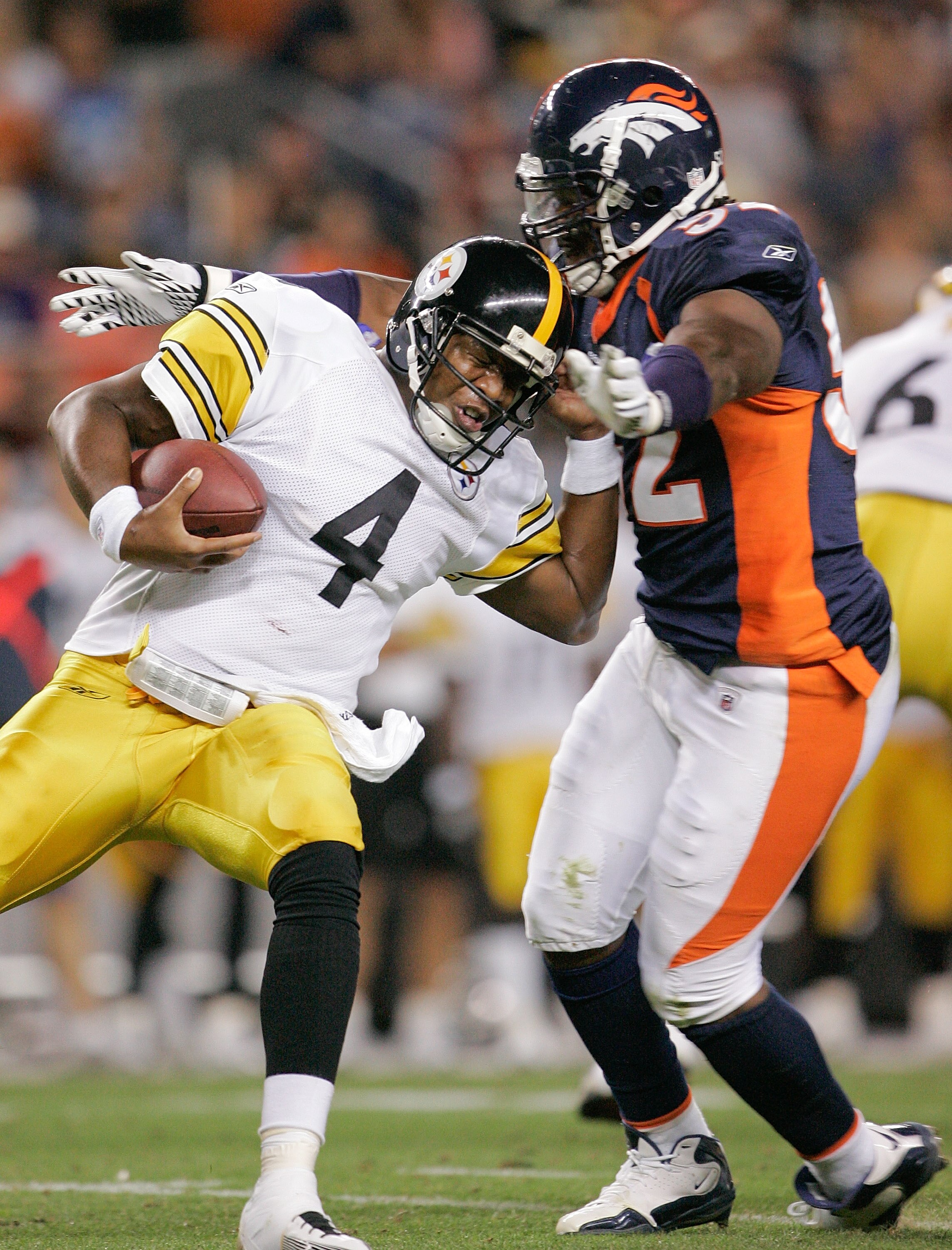 DENVER - AUGUST 29: Quarterback Byron Leftwich #4 of the Pittsburgh Steelers is sacked by linebacker Jason Hunter #52 of the Denver Broncos at INVESCO Field at Mile High on August 29, 2010 in Denver, Colorado.  (Photo by Justin Edmonds/Getty Images)