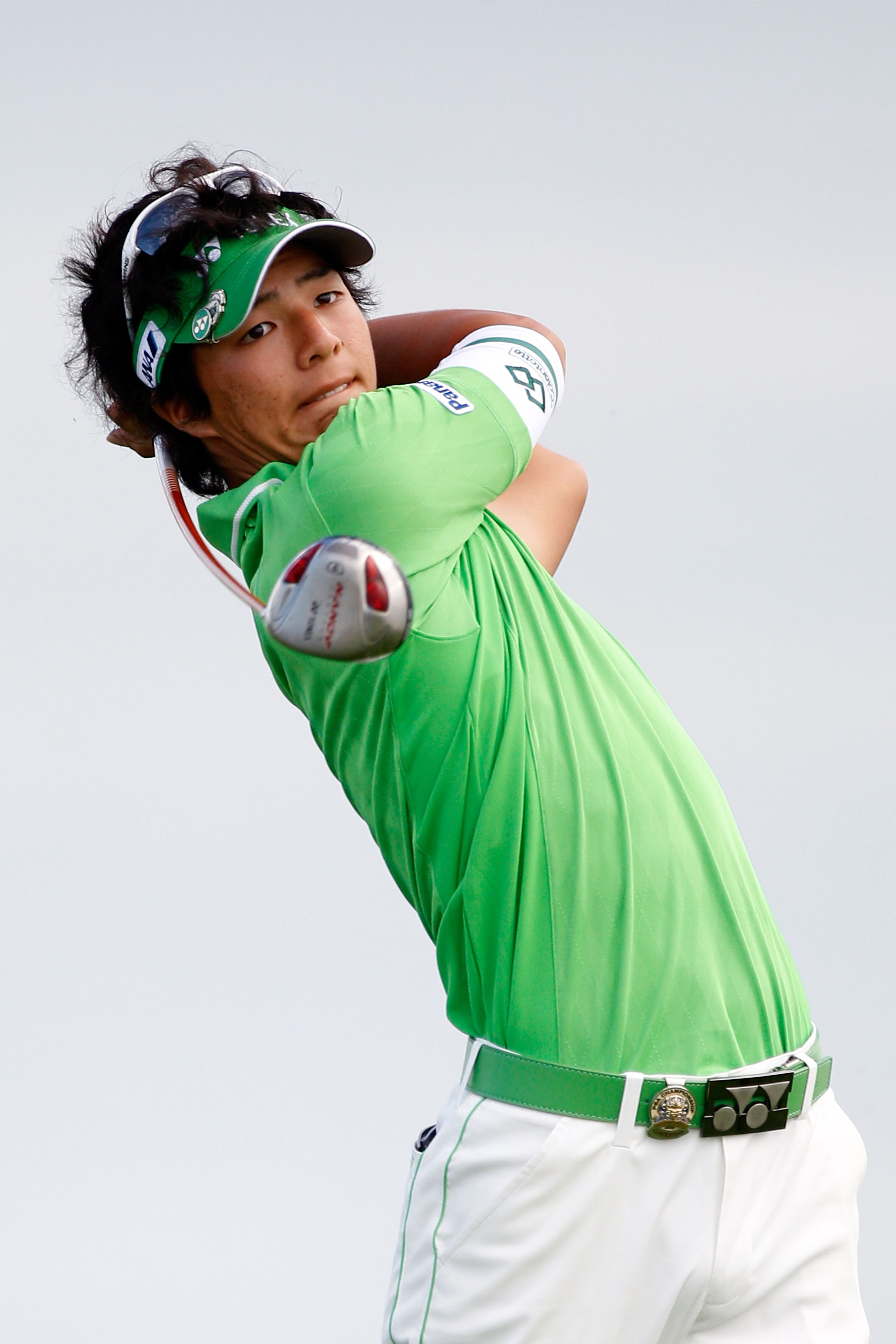 KOHLER, WI - AUGUST 14:  Ryo Ishikawa of Japan hits his tee shot on the 16th hole during the continuation of the second round of the 92nd PGA Championship on the Straits Course at Whistling Straits on August 14, 2010 in Kohler, Wisconsin.  (Photo by Chris