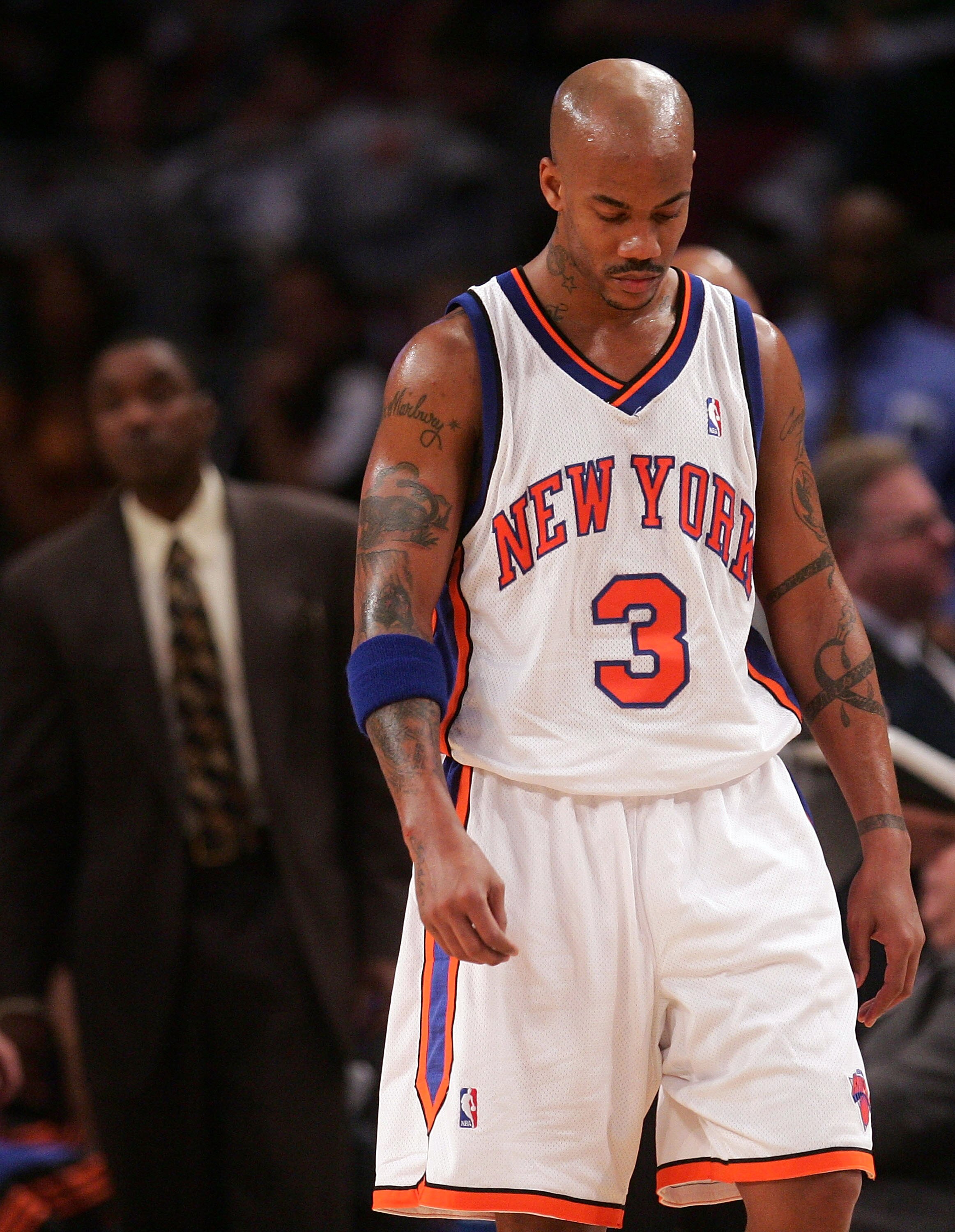 NEW YORK - NOVEMBER 24:  Stephon Marbury #3 of the New York Knicks walks from the bench as coach Isiah Thomas watches on against the Chicago Bulls on November 24, 2007 at Madison Square Garden in New York City. NOTE TO USER: User expressly acknowledges an