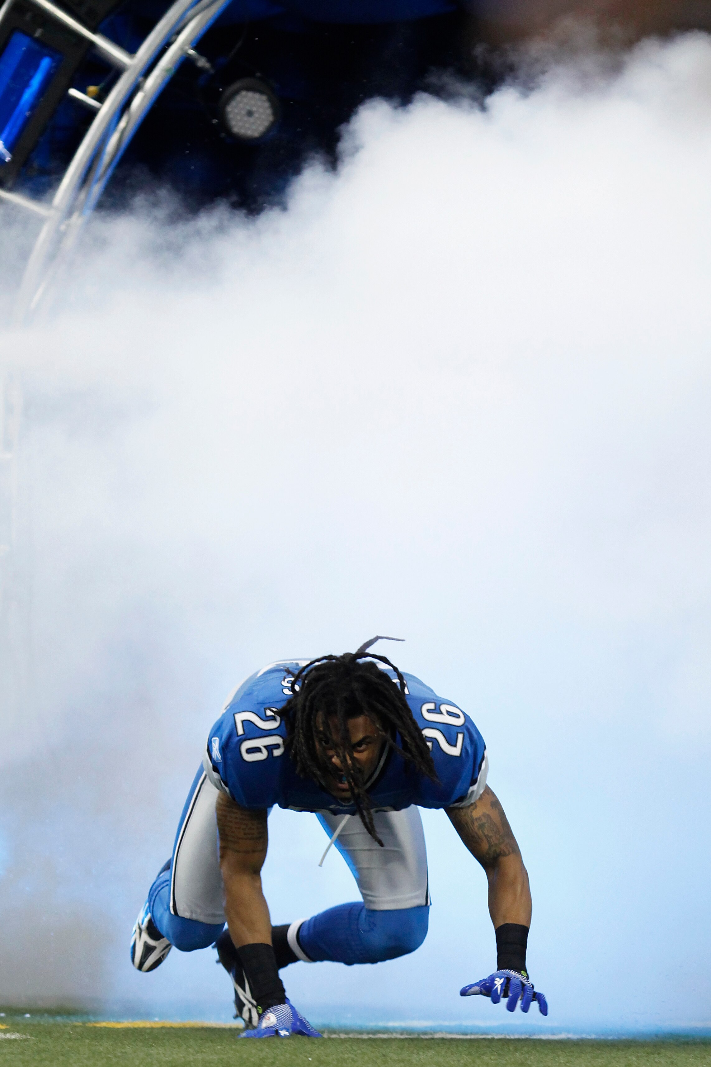 DETROIT, MI - NOVEMBER 22: Louis Delmas #26 of the Detroit Lions enters the stadium during player introductions before the game against the Cleveland Browns at Ford Field on November 22, 2009 in Detroit, Michigan. The Lions came from behind to defeat the