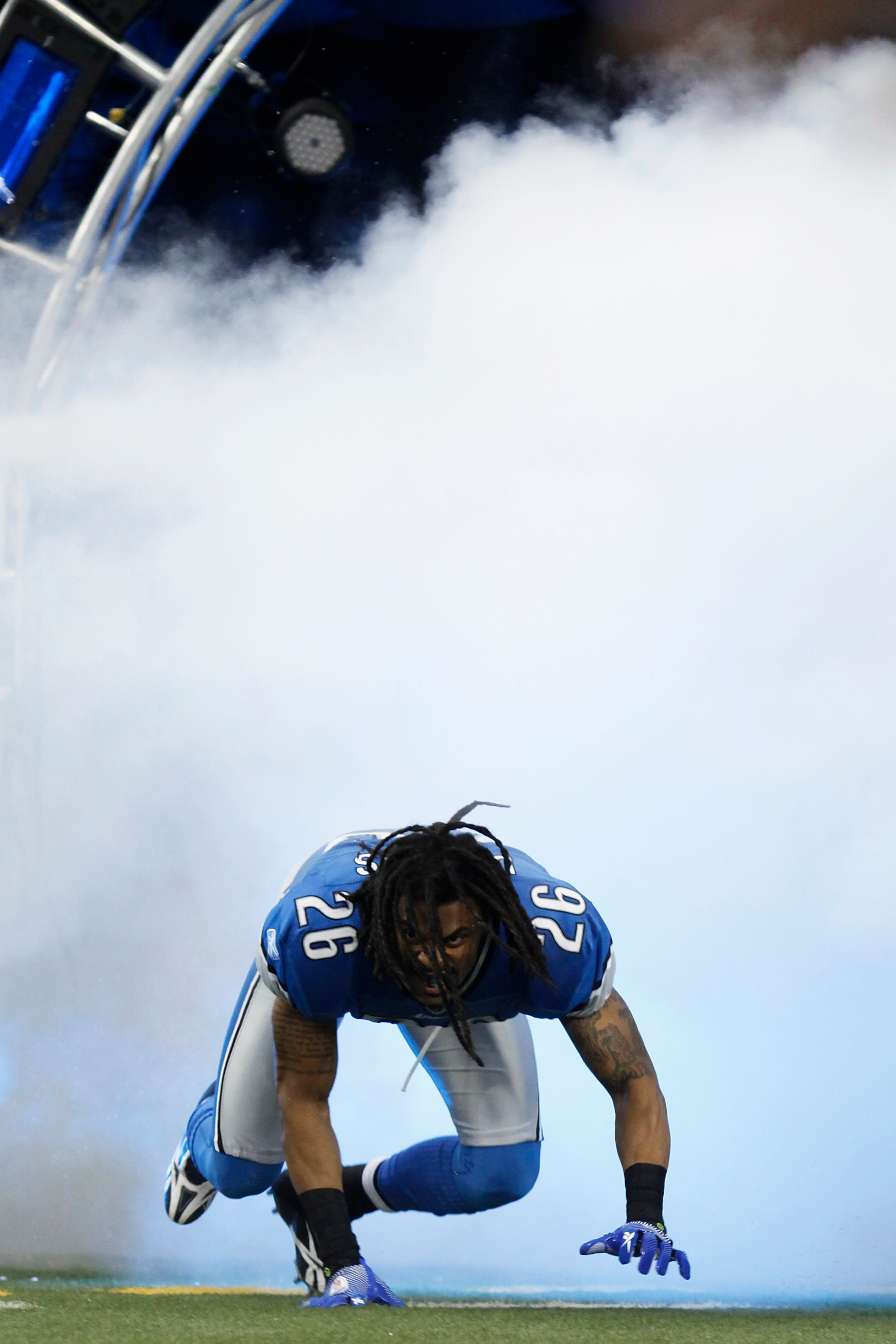 DETROIT, MI - NOVEMBER 22: Louis Delmas #26 of the Detroit Lions enters the stadium during player introductions before the game against the Cleveland Browns at Ford Field on November 22, 2009 in Detroit, Michigan. The Lions came from behind to defeat the DETROIT, MI - NOVEMBER 22: Louis Delmas #26 of the Detroit Lions enters the stadium during player introductions before the game against the Cleveland Browns at Ford Field on November 22, 2009 in Detroit, Michigan. The Lions came from behind to defeat the