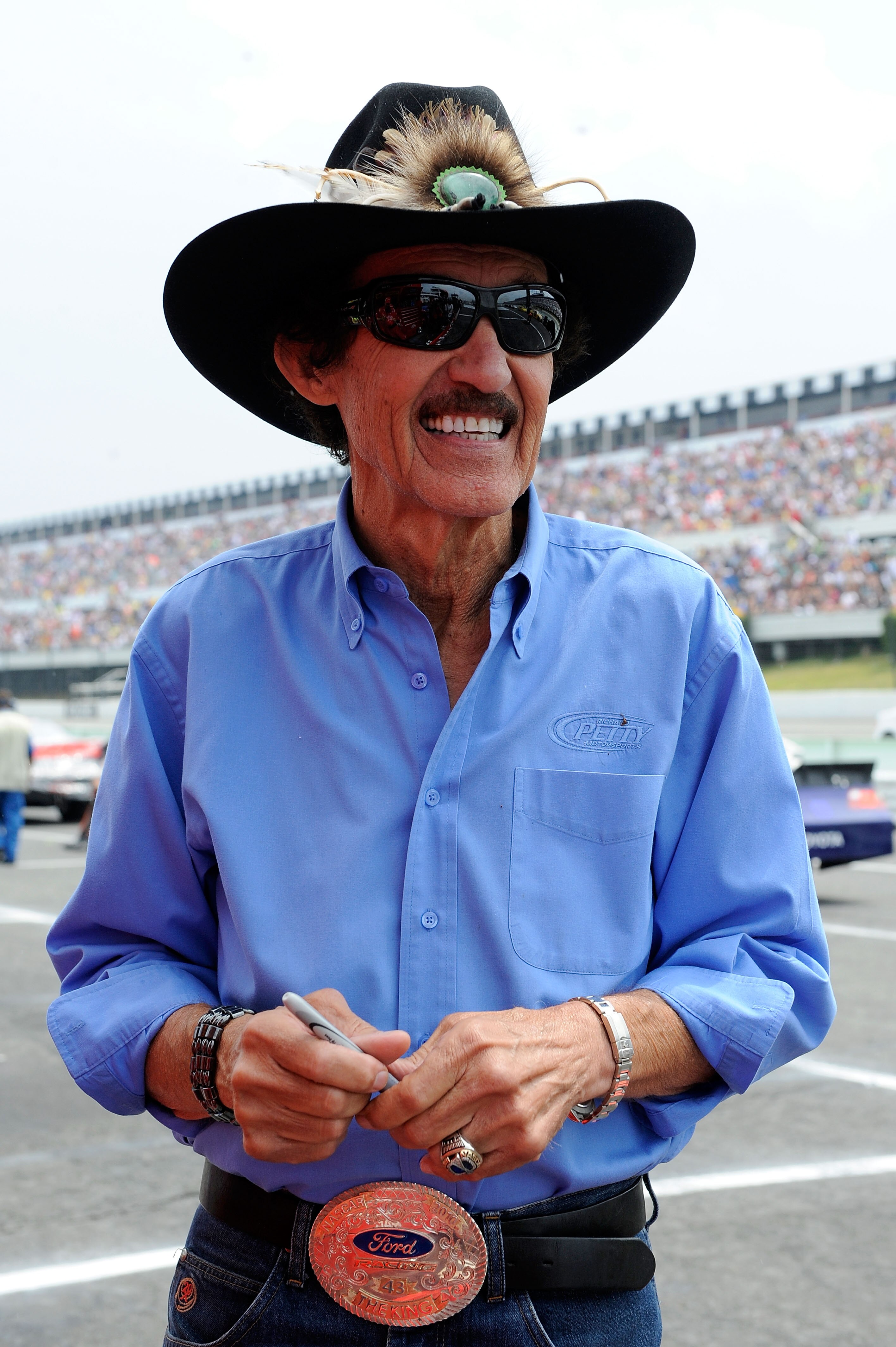 LONG POND, PA - AUGUST 01:  Team owner Richard Petty stands on the grid prior to the start of the NASCAR Sprint Cup Series Sunoco Red Cross Pennsylvania 500 at Pocono Raceway on August 1, 2010 in Long Pond, Pennsylvania.  (Photo by John Harrelson/Getty Im