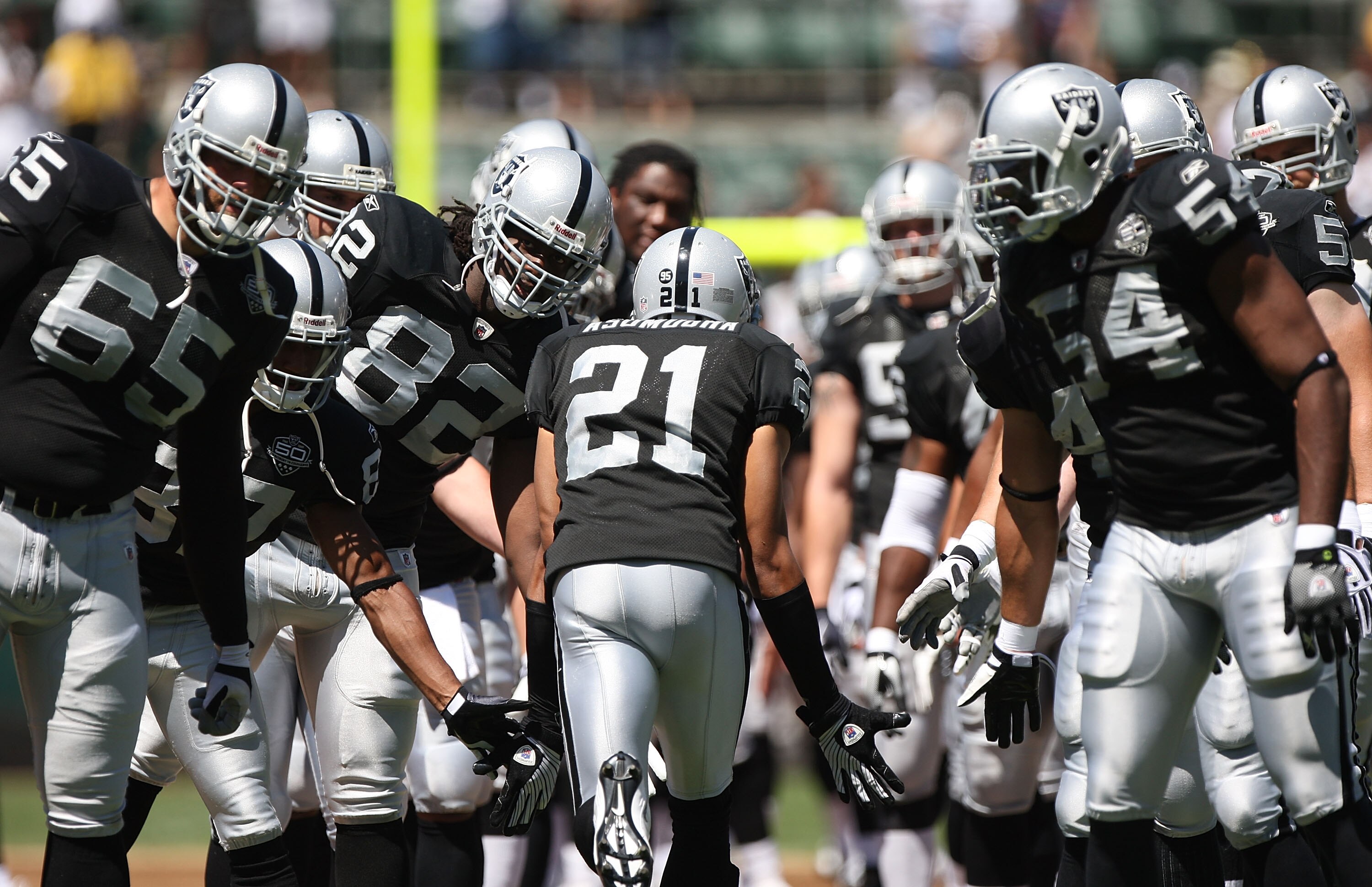 OAKLAND, CA - AUGUST 29:  Nnamdi Asomugha #21 of the Oakland Raiders is introduced against the New Orleans Saints during an NFL preseason game at Oakland-Alameda County Coliseum on August 29, 2009 in Oakland, California.  (Photo by Jed Jacobsohn/Getty Ima