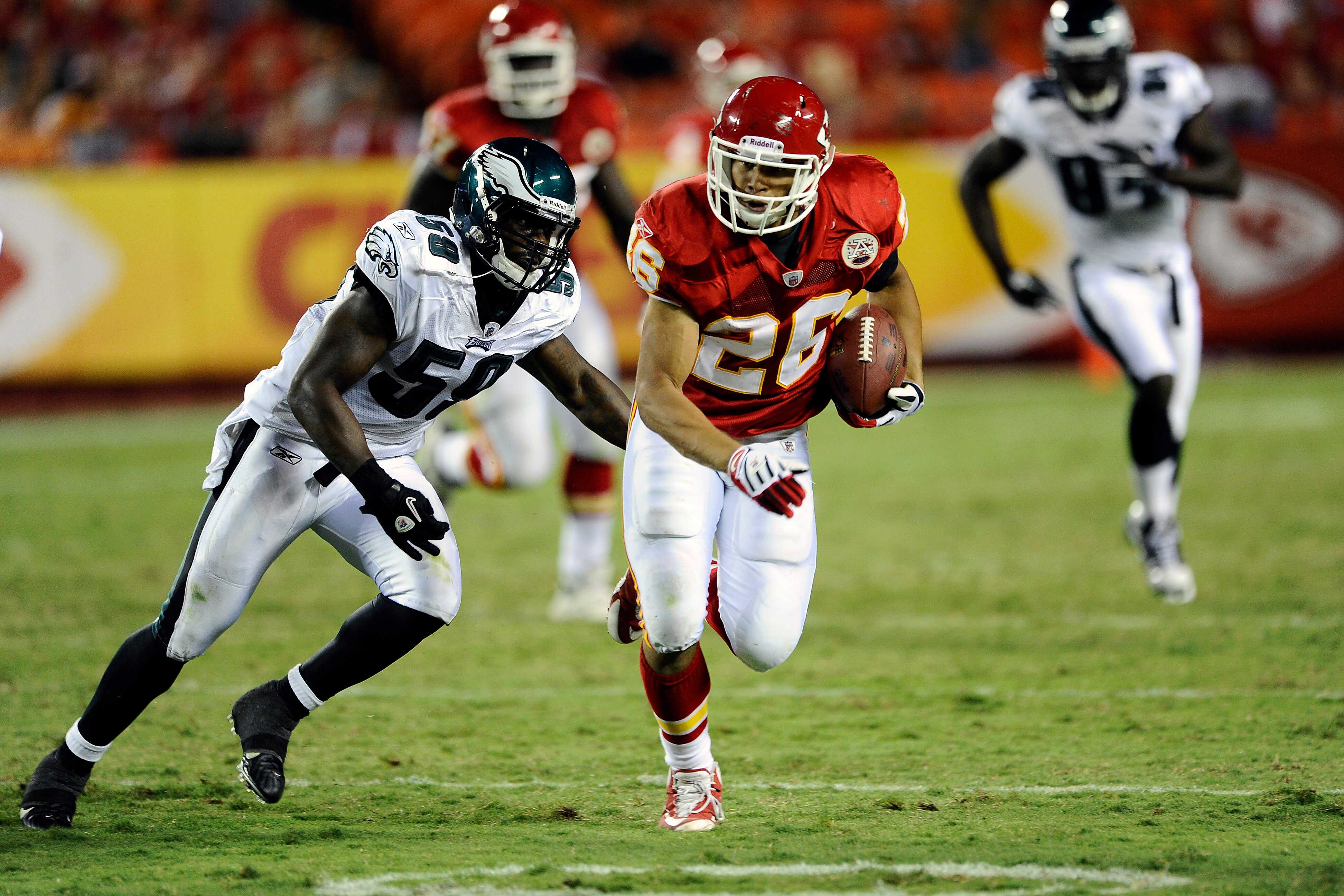 KANSAS CITY, MO - AUGUST 27: Jackie Battle #26 of the Kansas City Chiefs runs with a reception during a preseason game against the Philadelphia Eagles at Arrowhead Stadium on August 27, 2010 in Kansas City, Missouri.  (Photo by G. Newman Lowrance/Getty Im