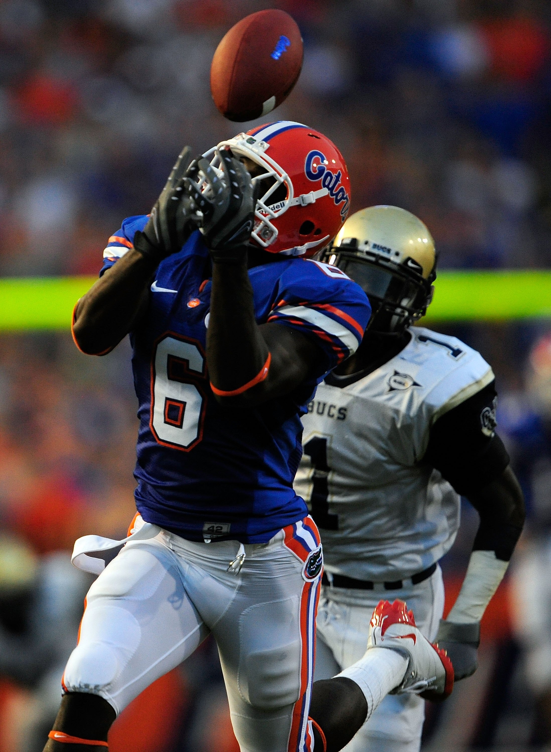 GAINESVILLE, FL - SEPTEMBER 5:  Deonte Thompson #6 of the Florida Gators attempts to make a reception during the game against the Charleston Southern Buccaneers at Ben Hill Griffin Stadium on September 5, 2009 in Gainesville, Florida.  (Photo by Sam Green