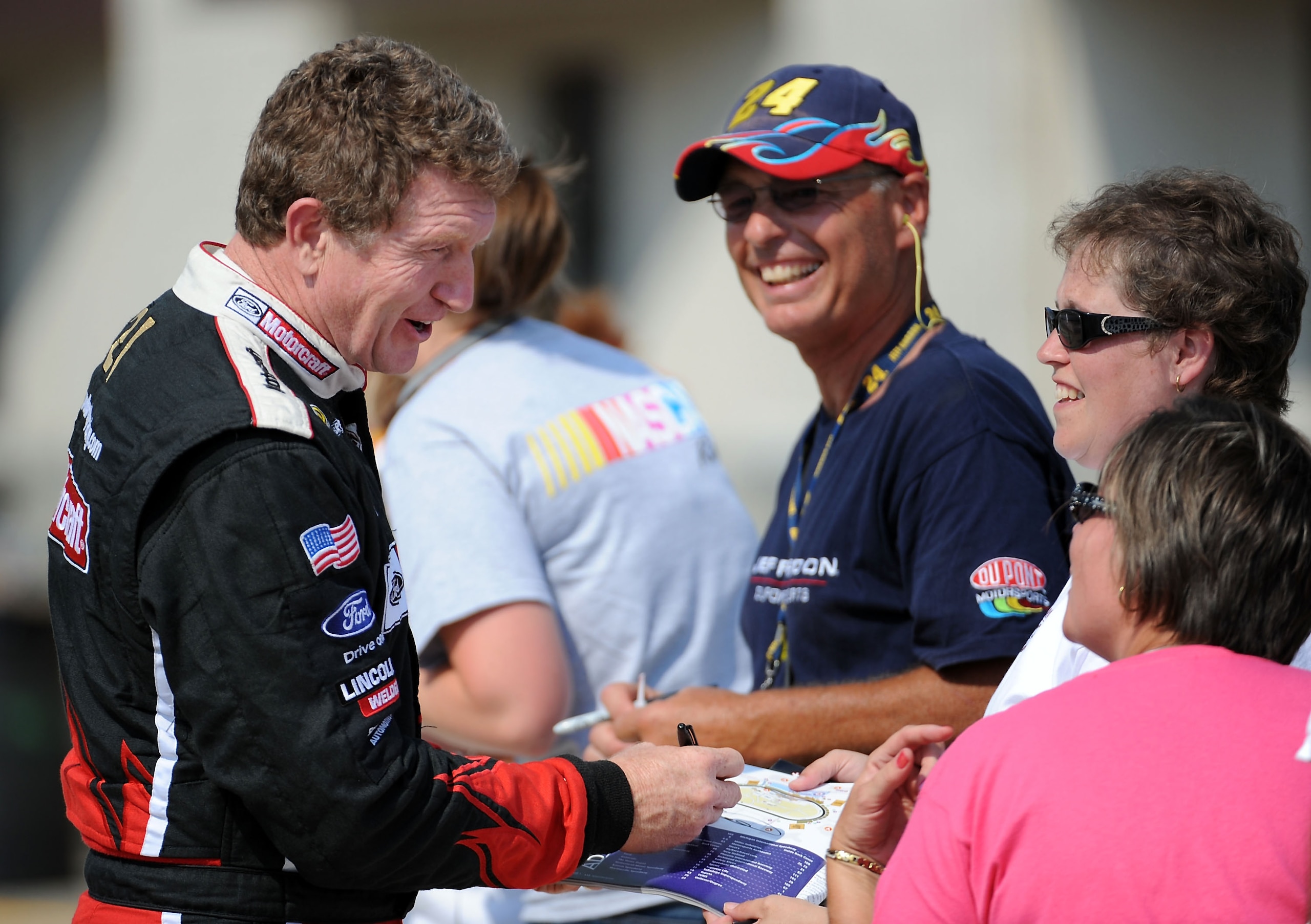 BROOKLYN, MI - AUGUST 14: Bill Elliott, driver of the #21 Motorcraft Ford, signs autographs during practice for the NASCAR Sprint Cup Series Michigan 400 at Michigan Internetional Speedway on August 14, 2009 in Brooklyn, Michigan. (Photo by Harry How/Ge BROOKLYN, MI - AUGUST 14: Bill Elliott, driver of the #21 Motorcraft Ford, signs autographs during practice for the NASCAR Sprint Cup Series Michigan 400 at Michigan Internetional Speedway on August 14, 2009 in Brooklyn, Michigan. (Photo by Harry How/Ge