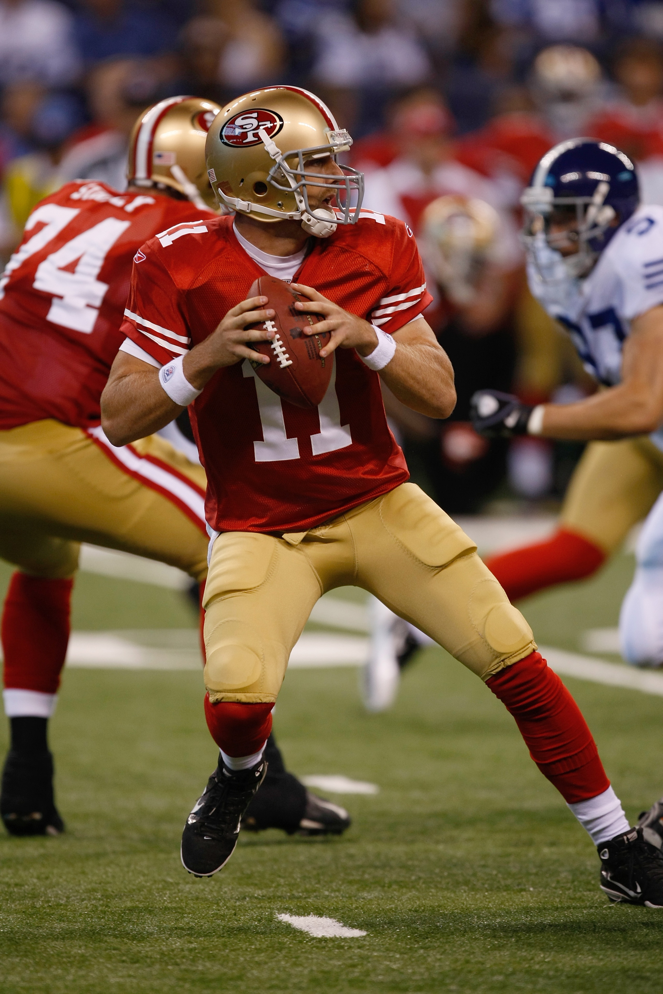 INDIANAPOLIS, IN - AUGUST 15: Alex Smith #11 of the San Francisco 49ers looks to pass during the preseason game against the Indianapolis Colts at Lucas Oil Stadium on August 15, 2010 in Indianapolis, Indiana.  (Photo by Scott Boehm/Getty Images)