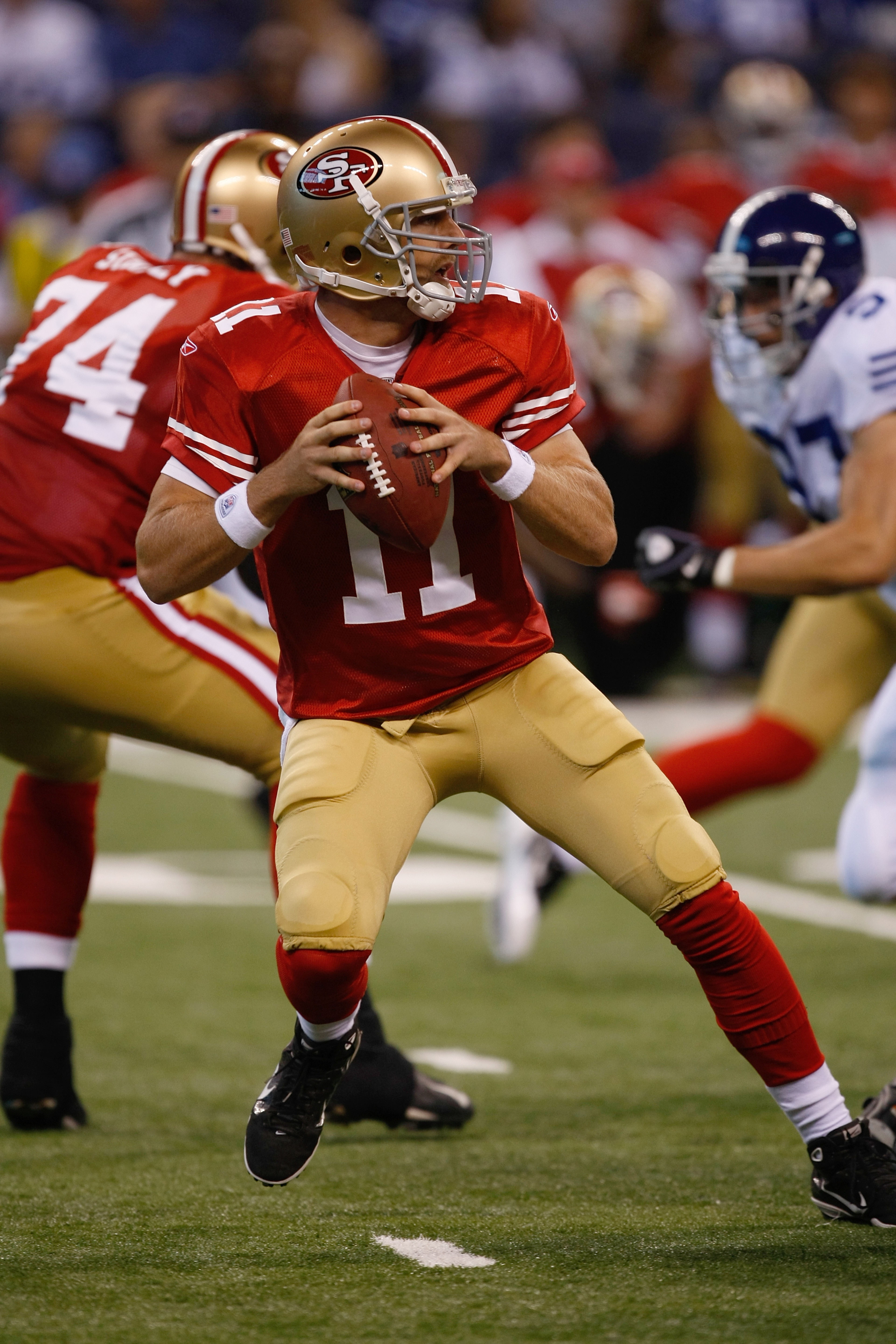 INDIANAPOLIS, IN - AUGUST 15: Alex Smith #11 of the San Francisco 49ers looks to pass during the preseason game against the Indianapolis Colts at Lucas Oil Stadium on August 15, 2010 in Indianapolis, Indiana.  (Photo by Scott Boehm/Getty Images)