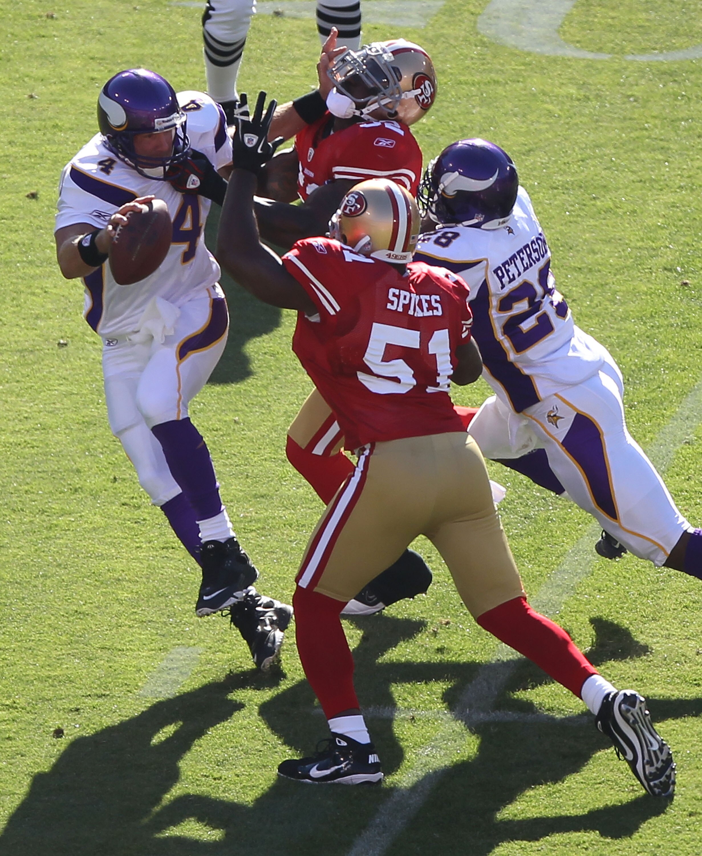 SAN FRANCISCO - AUGUST 22:  Brett Favre #4 of the Minnesota Vikings is pressured by Patrick Willis #52 and Takeo Spikes #51 of the San Francisco 49ers during an NFL pre-season game at Candlestick Park on August 22, 2010 in San Francisco, California.  (Pho