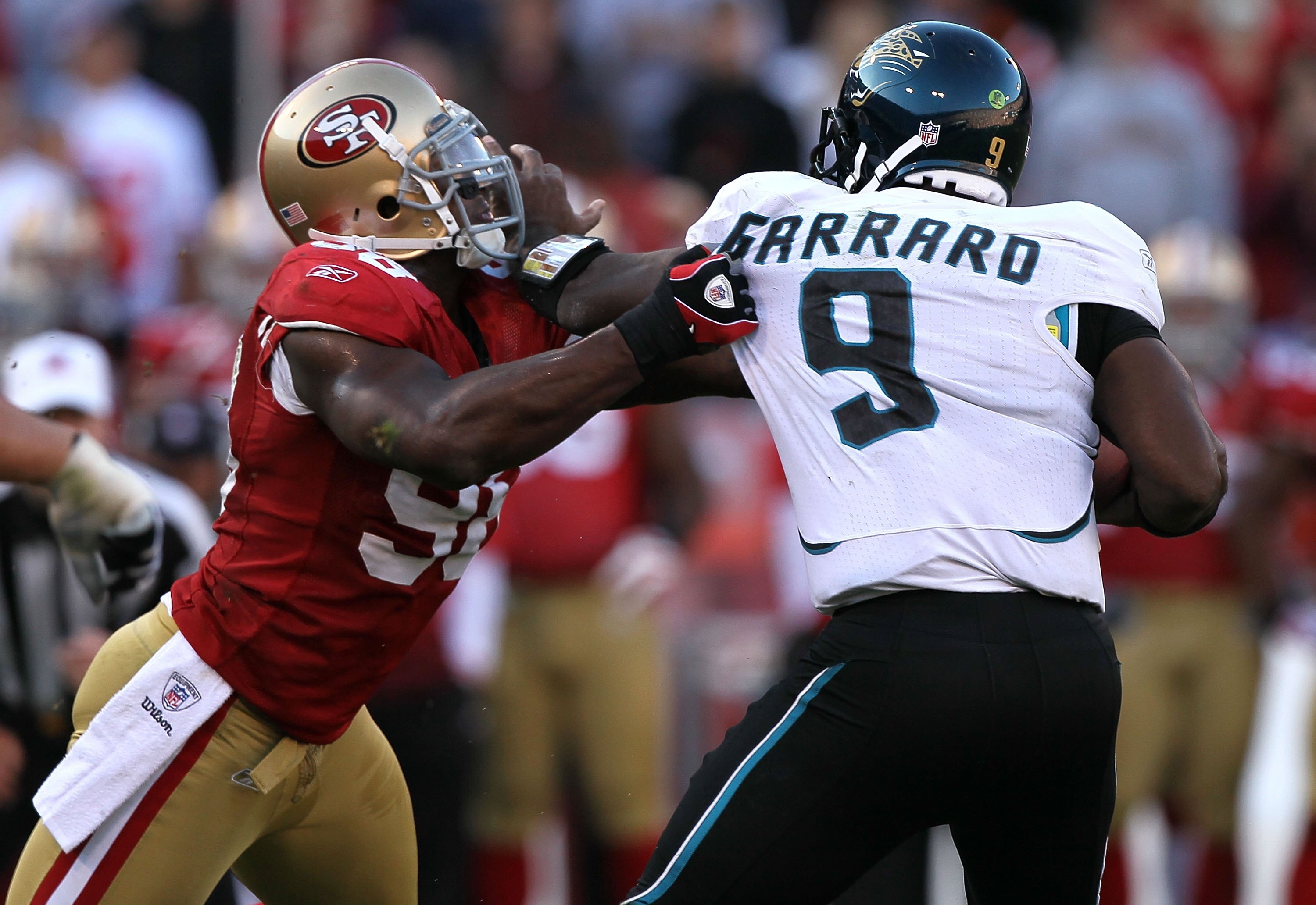 SAN FRANCISCO - NOVEMBER 29:  David Garrard #9 of the Jacksonville Jaguars is sacked by Parys Haralson #98 of the San Francisco 49ers during an NFL game at Candlestick Park on November 29, 2009 in San Francisco, California.  (Photo by Jed Jacobsohn/Getty 
