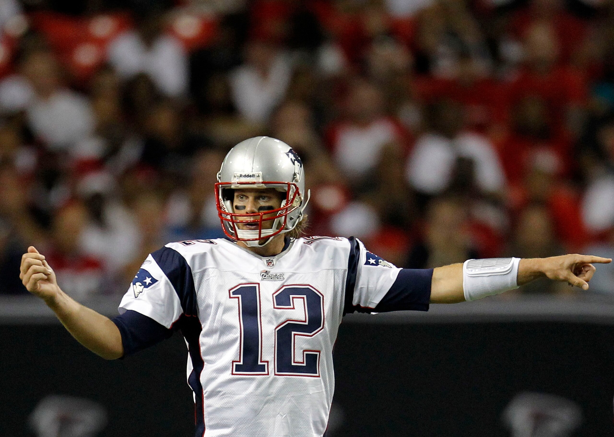 ATLANTA - AUGUST 19: Quarterback Tom Brady #12 of the New England Patriots directs the offense during the preseason game against the Atlanta Falcons at the Georgia Dome on August 19, 2010 in Atlanta, Georgia. (Photo by Mike Zarrilli/Getty Images) ATLANTA - AUGUST 19: Quarterback Tom Brady #12 of the New England Patriots directs the offense during the preseason game against the Atlanta Falcons at the Georgia Dome on August 19, 2010 in Atlanta, Georgia. (Photo by Mike Zarrilli/Getty Images)