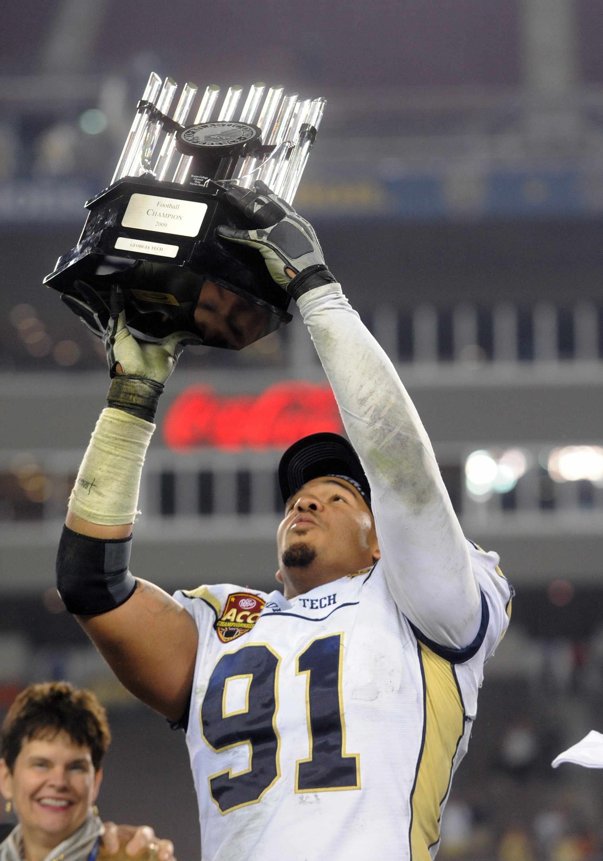 TAMPA, FL - NOVEMBER 28: Defensive end Derrick Morgan #91 of the Georgia Tech Yellow Jackets celebrates a victory against the Clemson Tigers in the 2009 ACC Football Championship Game December 5, 2009 at Raymond James Stadium in Tampa, Florida.  (Photo by